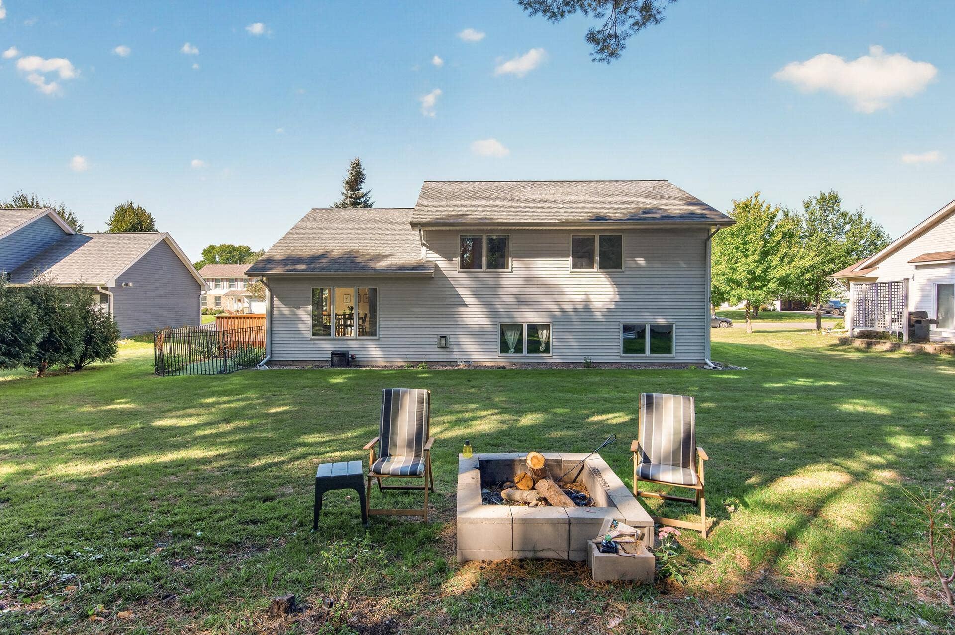 5956 Norway Pine Court, White Bear Lake, MN 55110 A private backyard setting with room to gather around the fire and enjoy the outdoors.