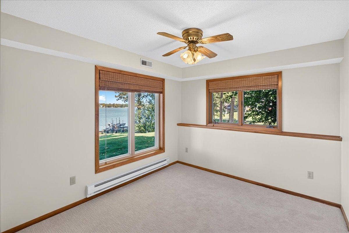 Lower Level Bedroom Lakeside with fresh carpet and perfect views