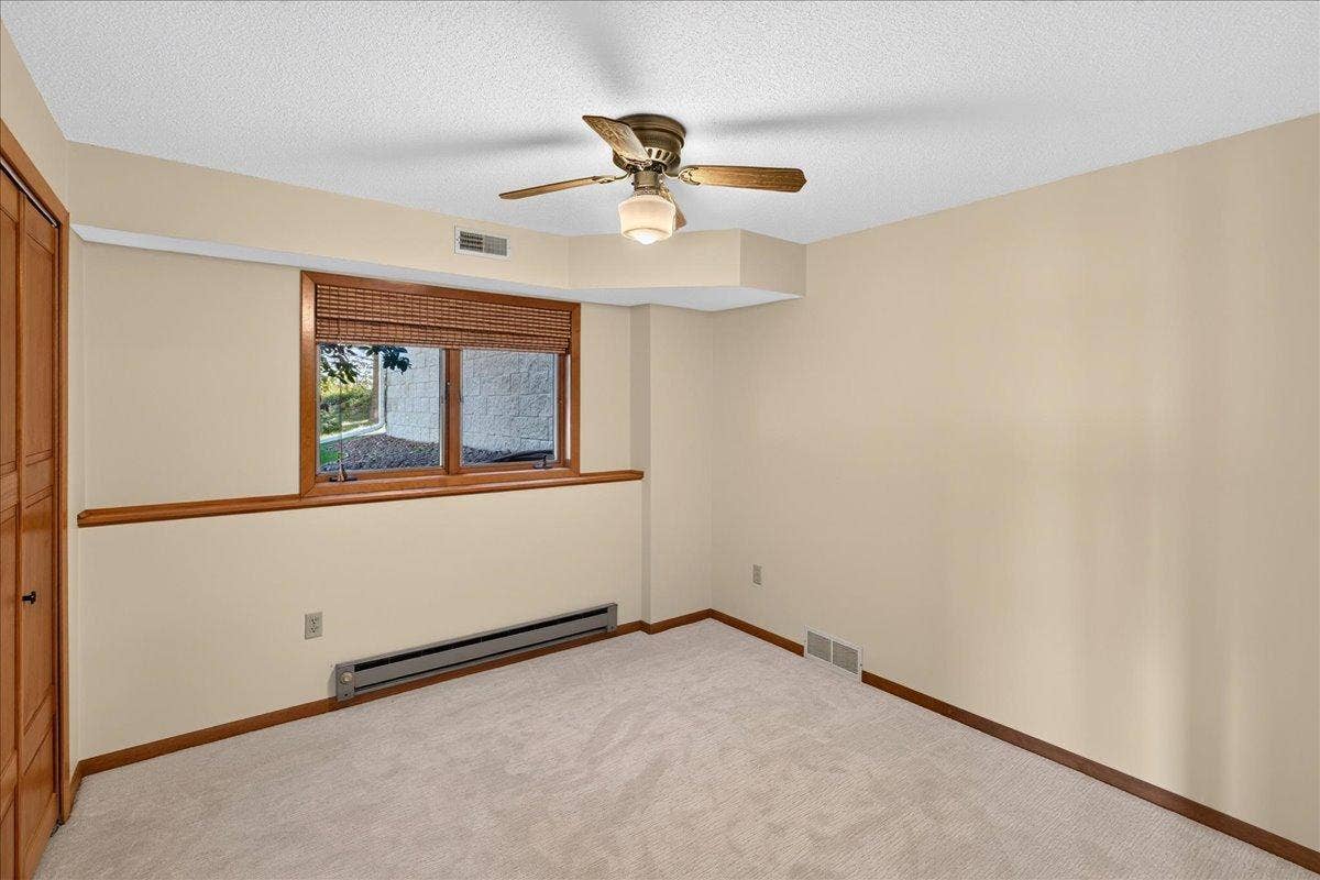 Bedroom #3 in Lower level of home offers fresh paint and new carpet