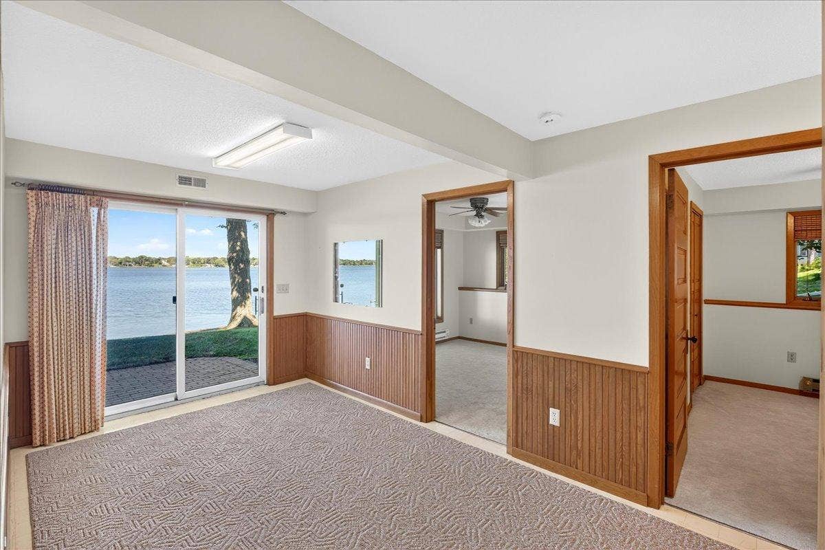 Two bedrooms in the lower level both offering fresh paint and new carpet.