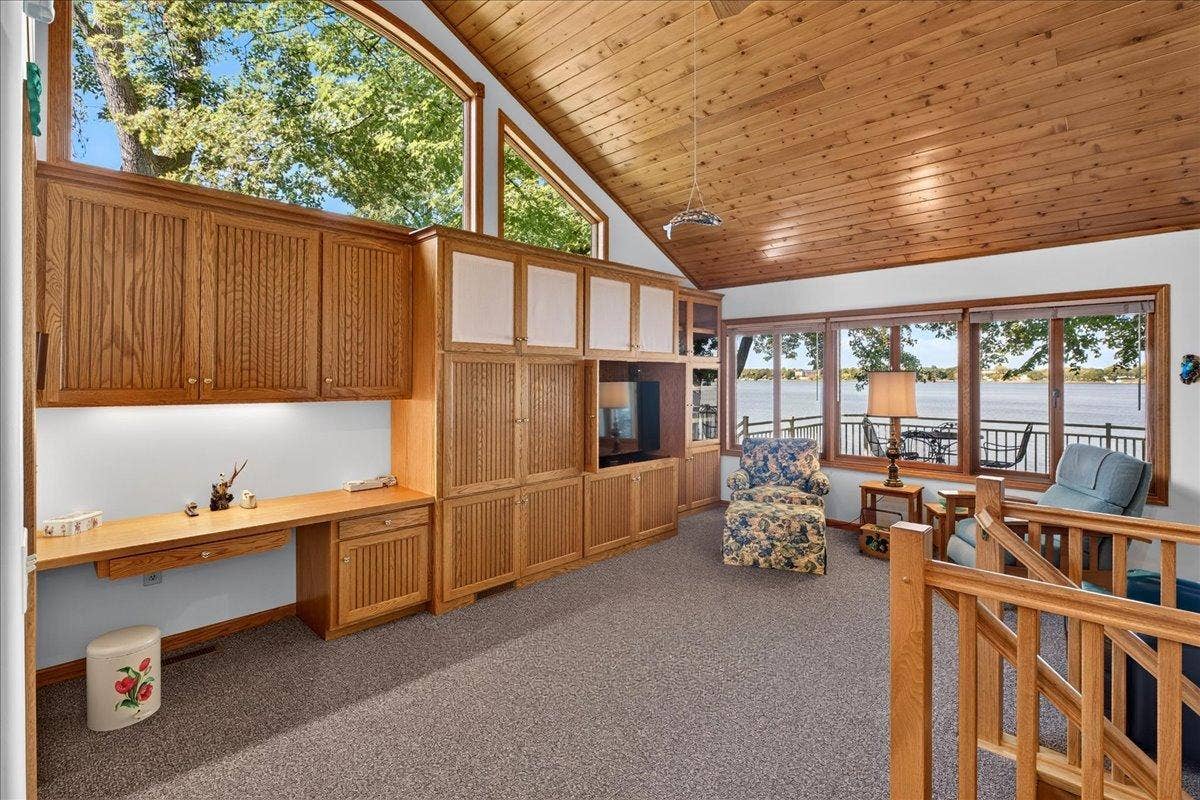 Knotty Alder Ceilings Bring Warm Cabin Character to This Year-Round Lake Home