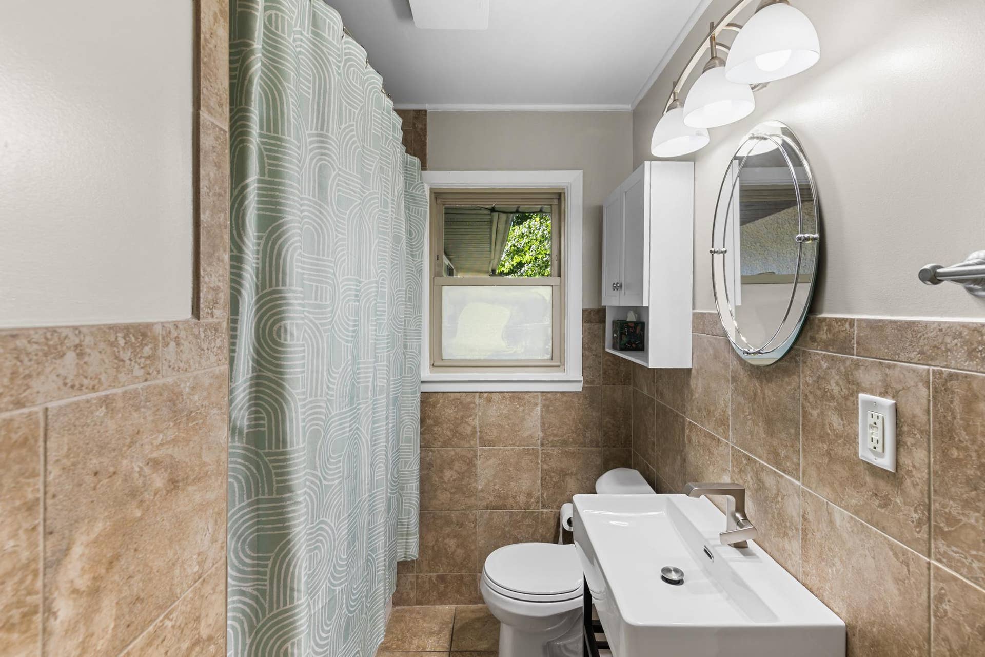 Main level full bathroom.