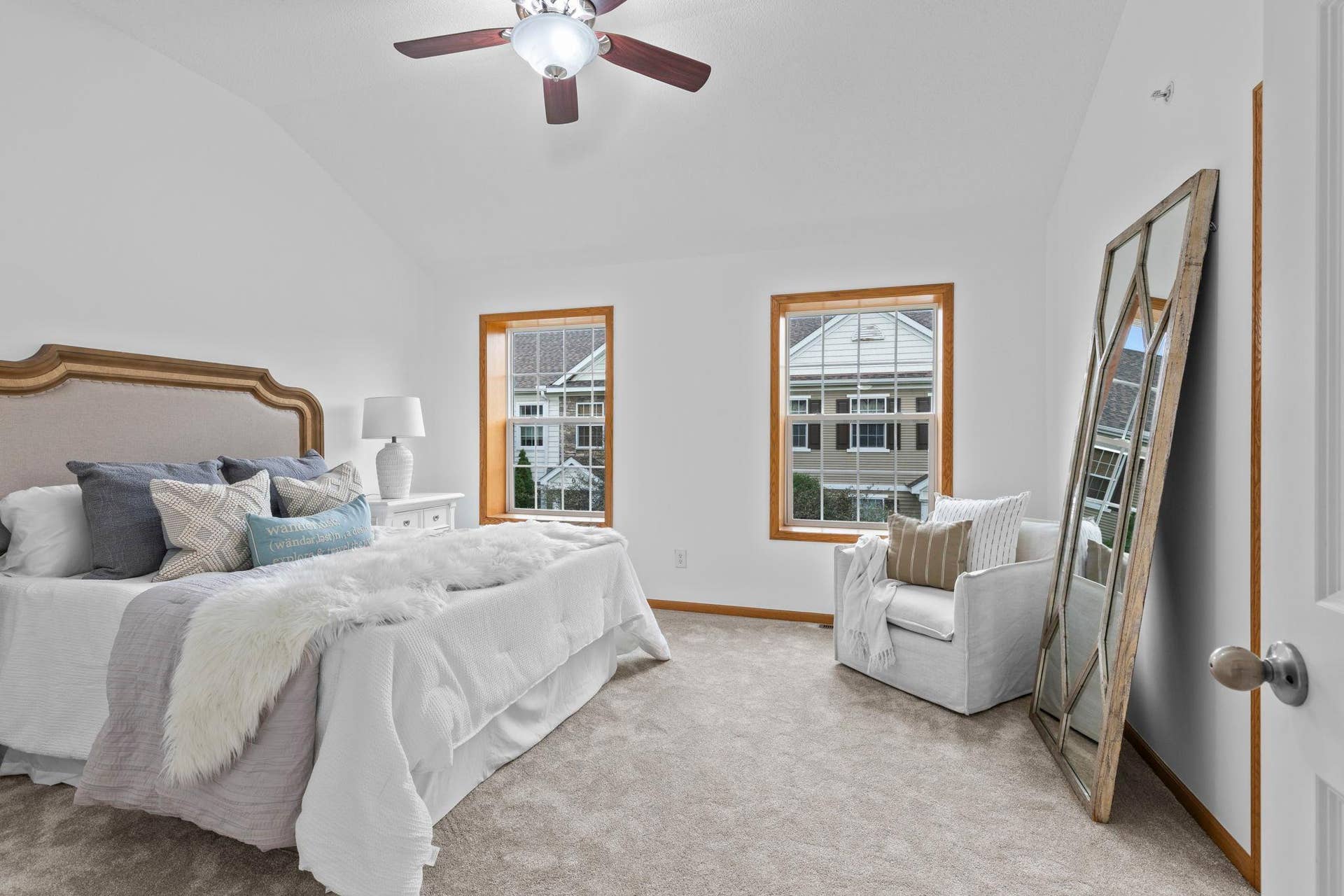 1626 Woodlynn Avenue, #1, Maplewood, MN 55109 Upstairs, you'll find three bedrooms, all featuring brand-new carpeting, including a spacious primary suite with 10-foot vaulted ceilings, a ceiling fan, and a large front-facing window.