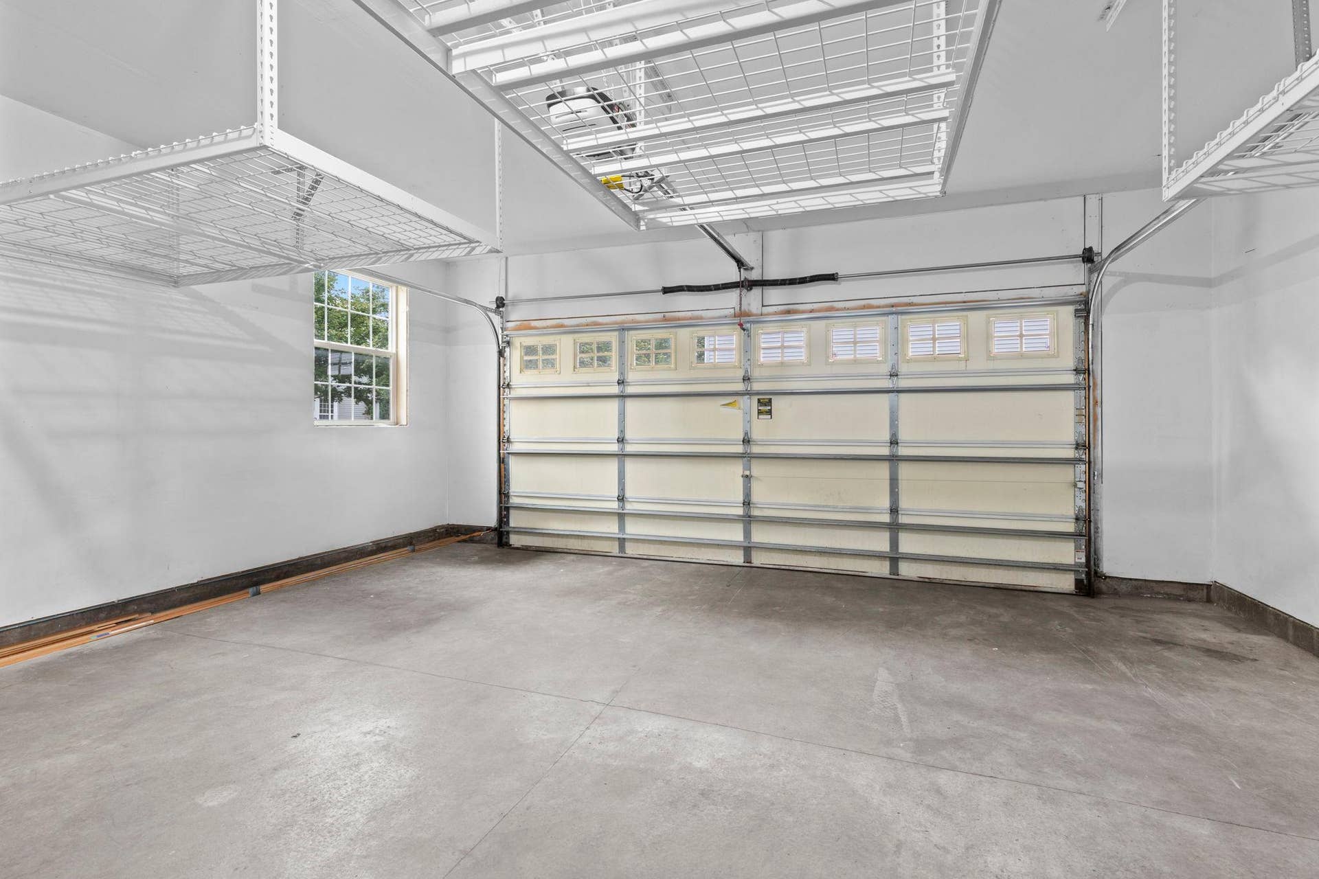 1626 Woodlynn Avenue, #1, Maplewood, MN 55109 The spacious attached 2-car garage with overhead storage.