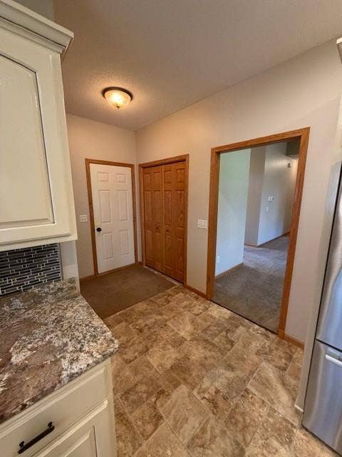 4235 4th Street S, Saint Cloud, MN 56301 25 kitchen garage service living room entry perspective.jpg