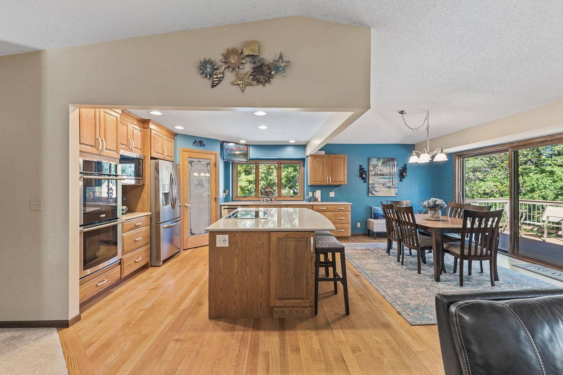 1615 Laurel Avenue, Hudson, WI 54016 1615 Laurel Ave Kitchen island for an eat in kitchen and diningroom area with walkout to the maintenance free deck