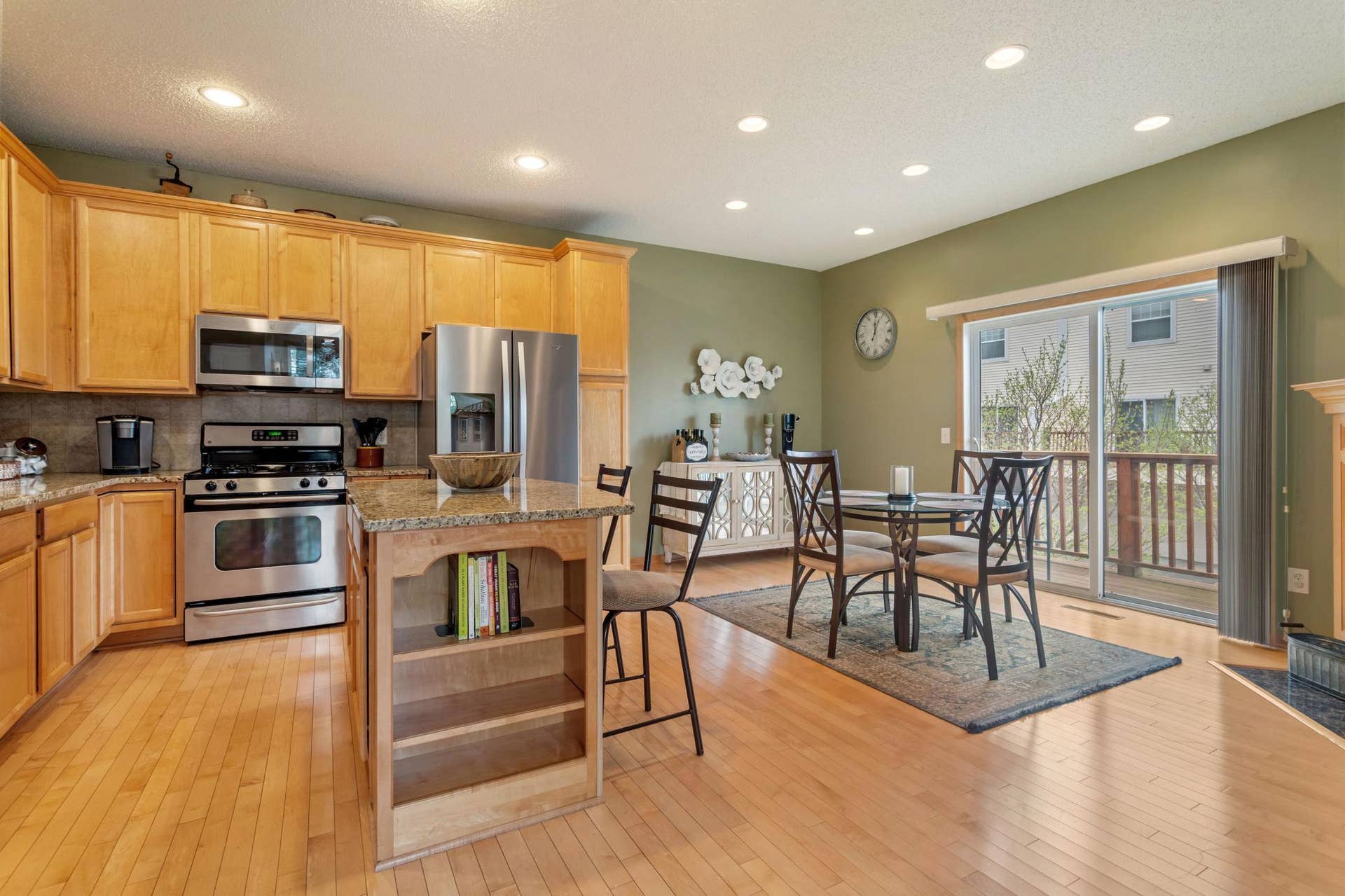 14633 Victor Hugo Boulevard N, #4, Hugo, MN 55038 Center island with bookshelf storage