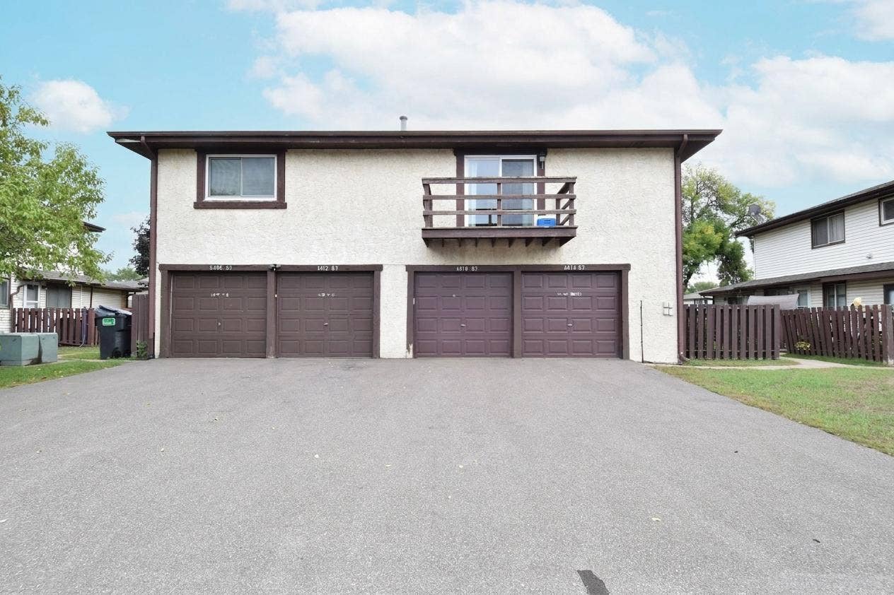 6410 83rd Court N, Brooklyn Park, MN 55445 Garage for this unit is the 2nd in from the Right