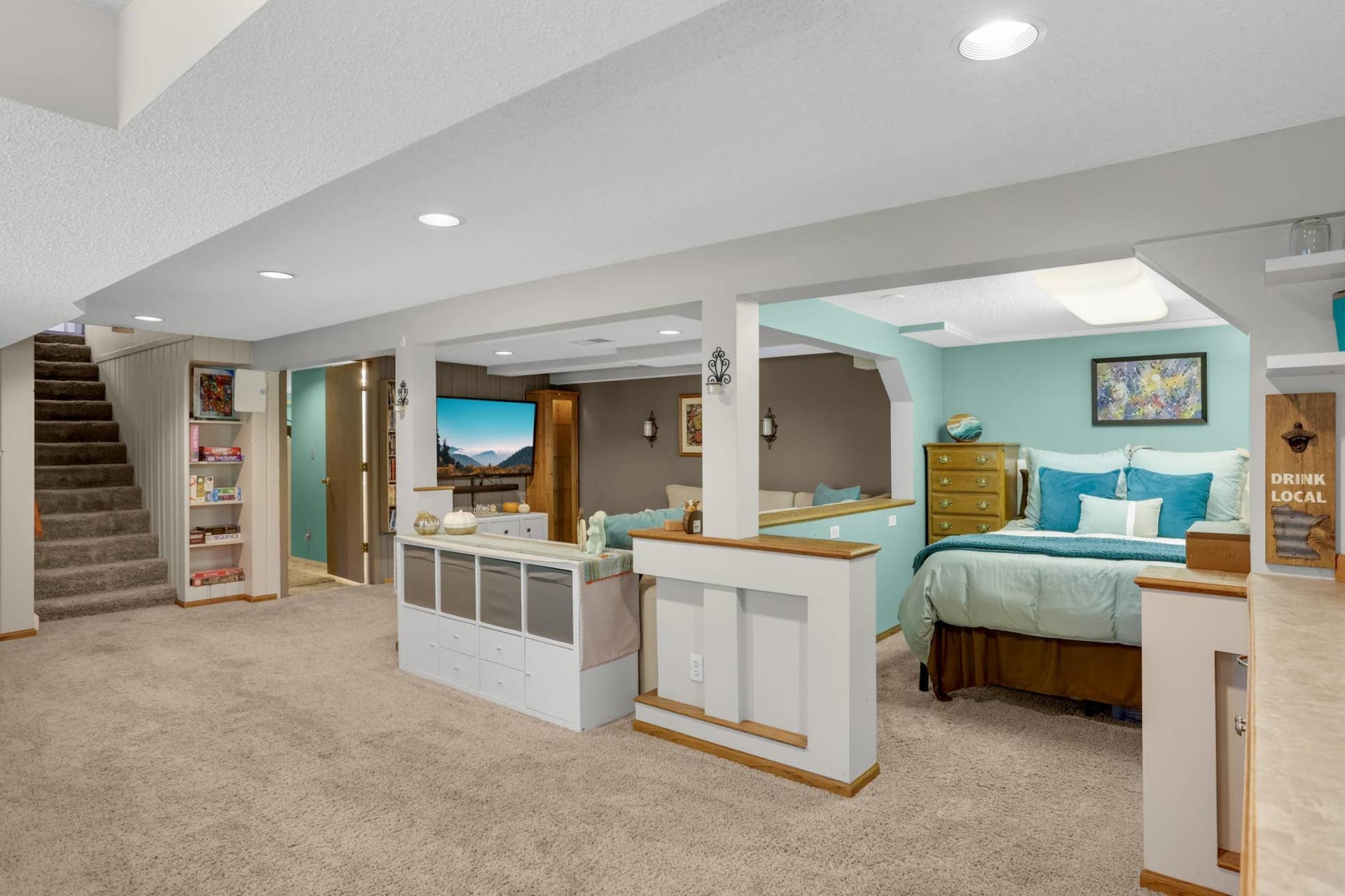 Open boxed in space for game table or currently used as a guest suite.