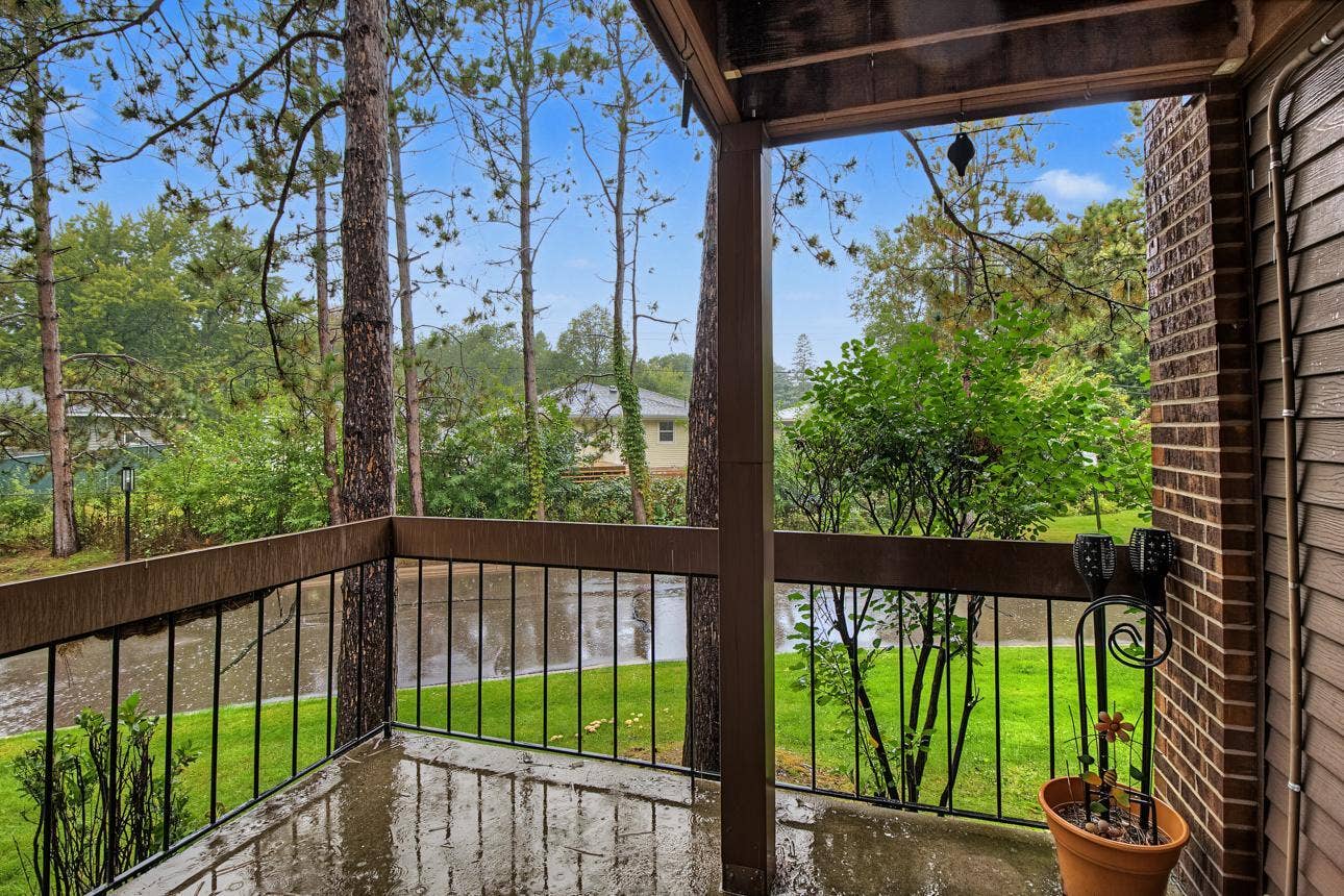 9700 Portland Avenue S, #128, Bloomington, MN 55420 Located off the primary bedroom this is such an inviting balcony to enjoy.