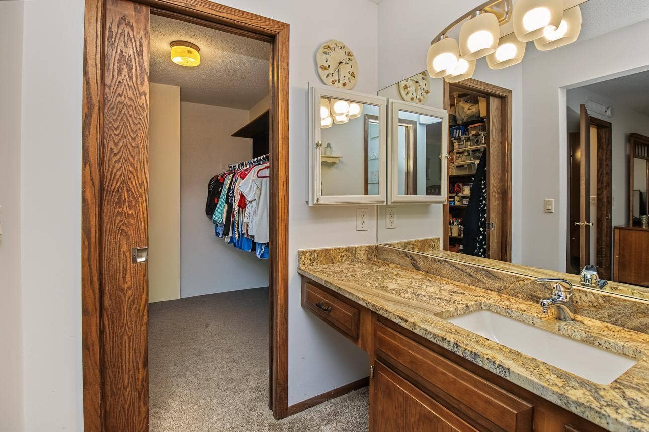 9700 Portland Avenue S, #128, Bloomington, MN 55420 Walk in closet in primary bedroom.