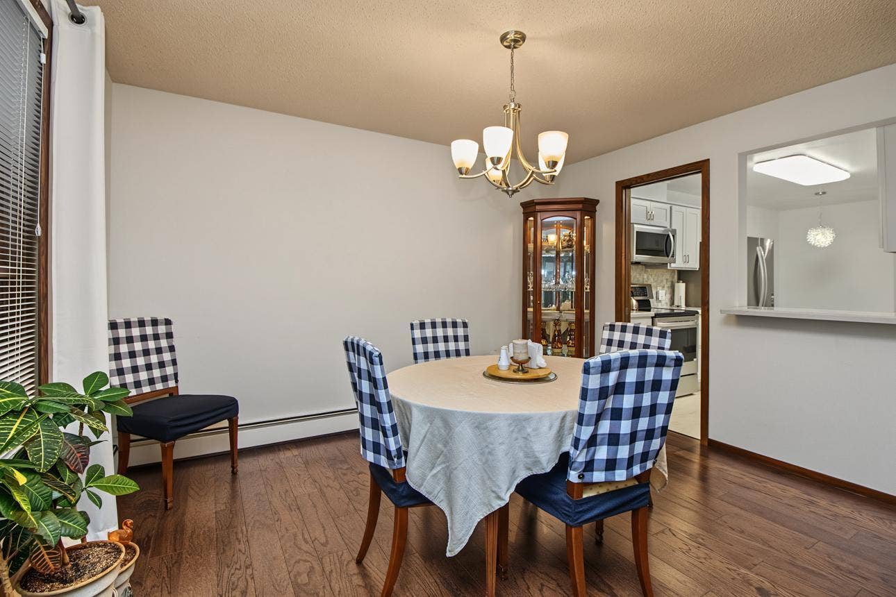 9700 Portland Avenue S, #128, Bloomington, MN 55420 Dining room with hardwood floors conveniently just off the kitchen.