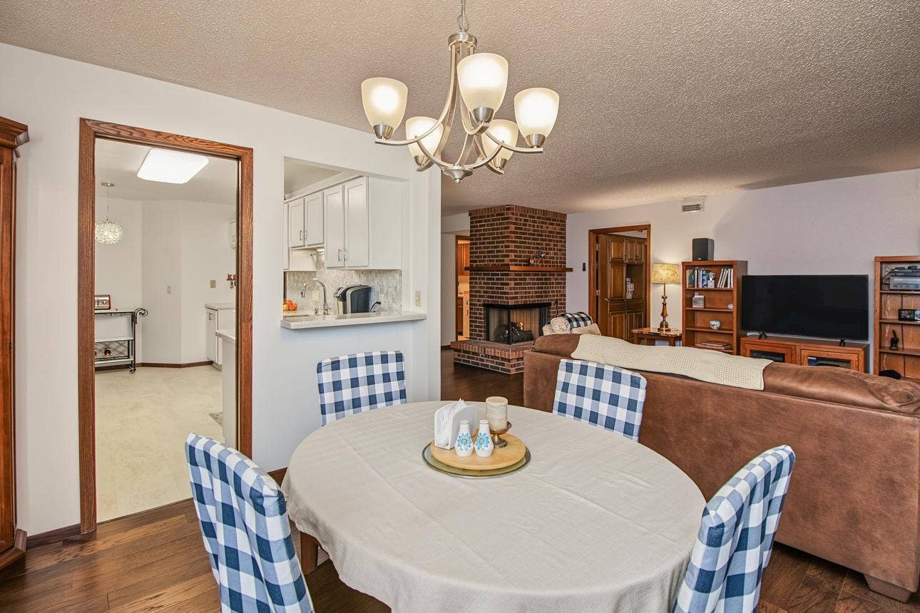 9700 Portland Avenue S, #128, Bloomington, MN 55420 Open concept dining room to living room.