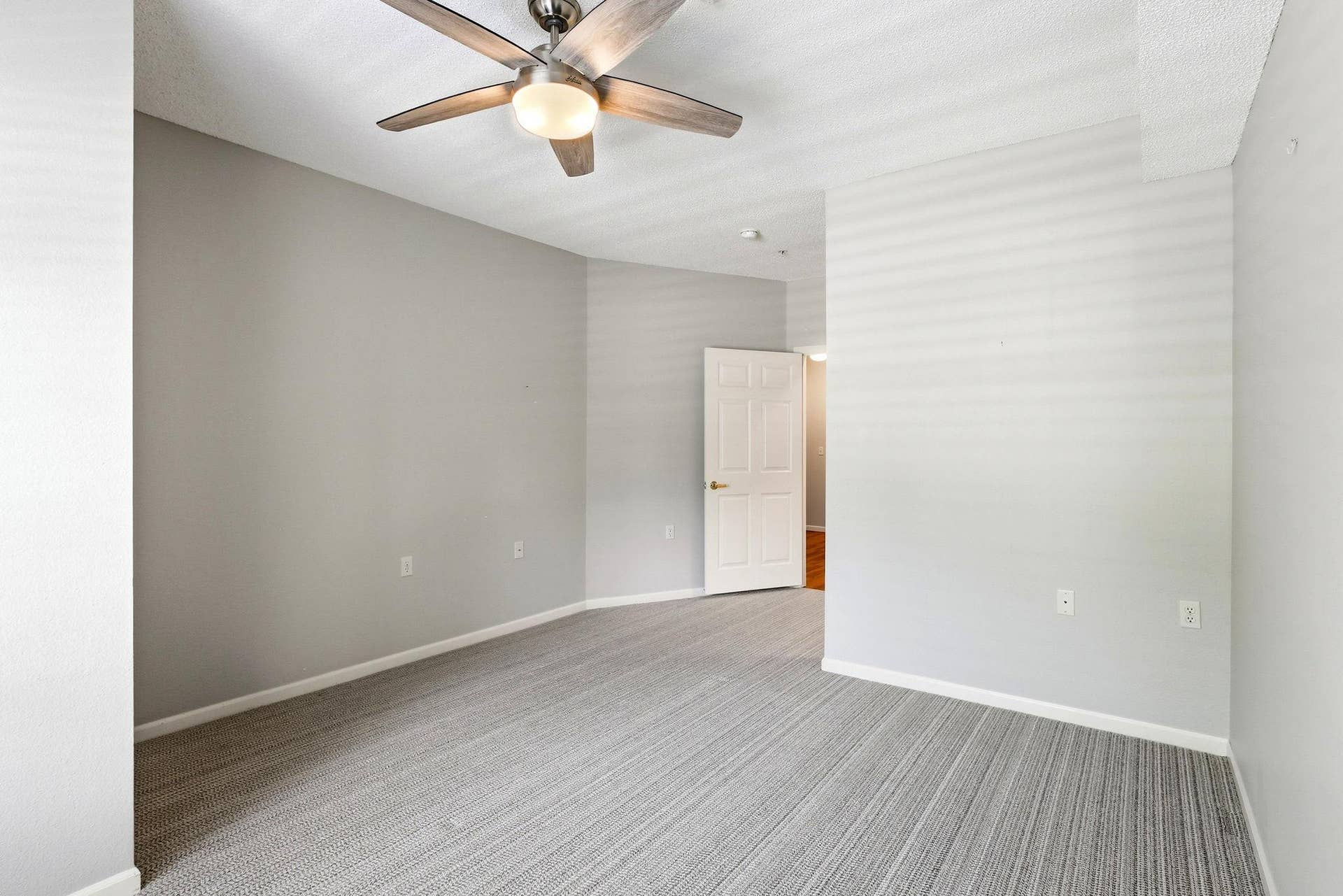 3800 85th Avenue N, #117, Brooklyn Park, MN 55443 The spacious bedroom flow to the hallway, bathroom and walk in closet.