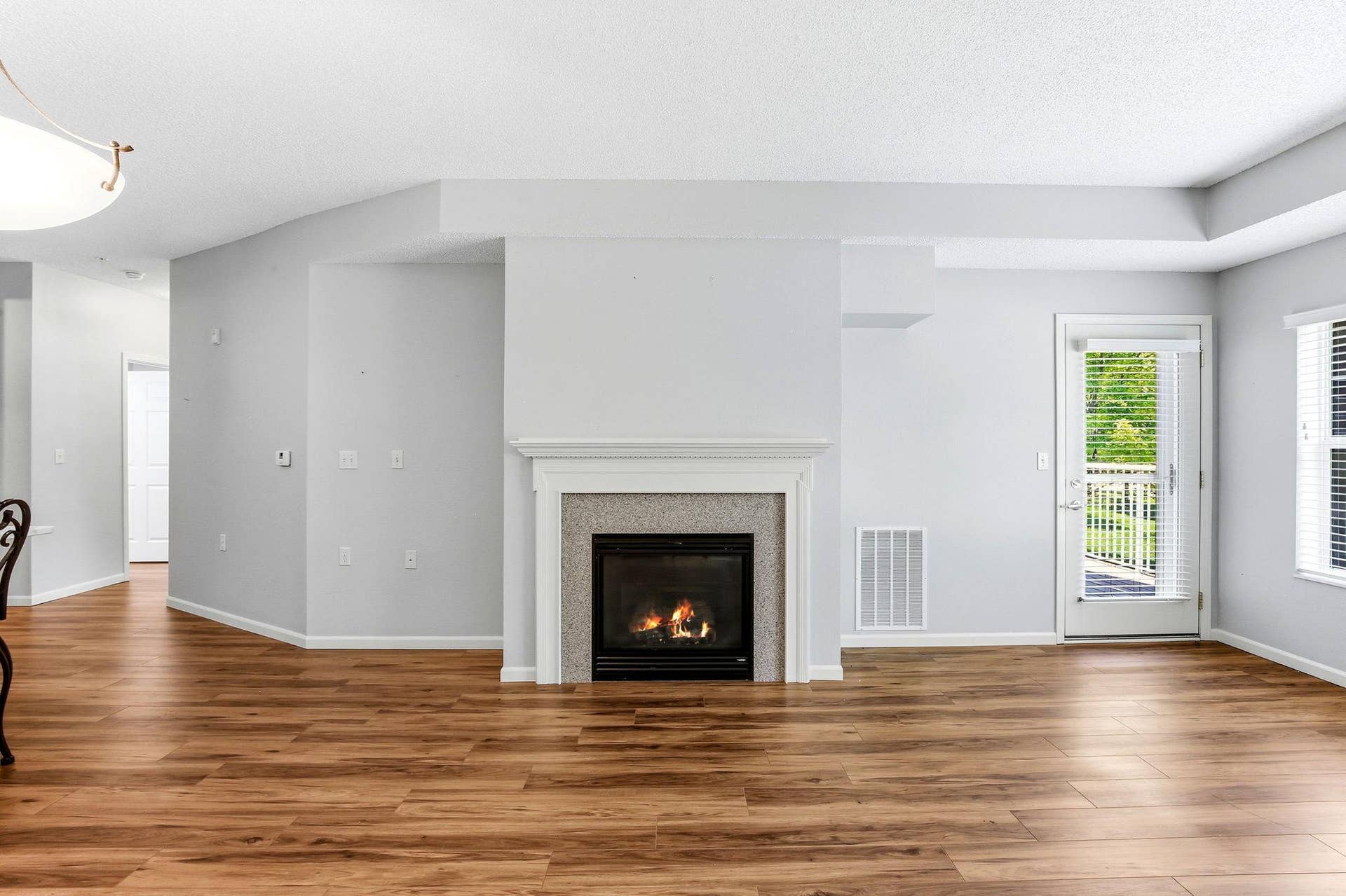 3800 85th Avenue N, #117, Brooklyn Park, MN 55443 A lovely gas fireplace warms the wonderful open spaces.