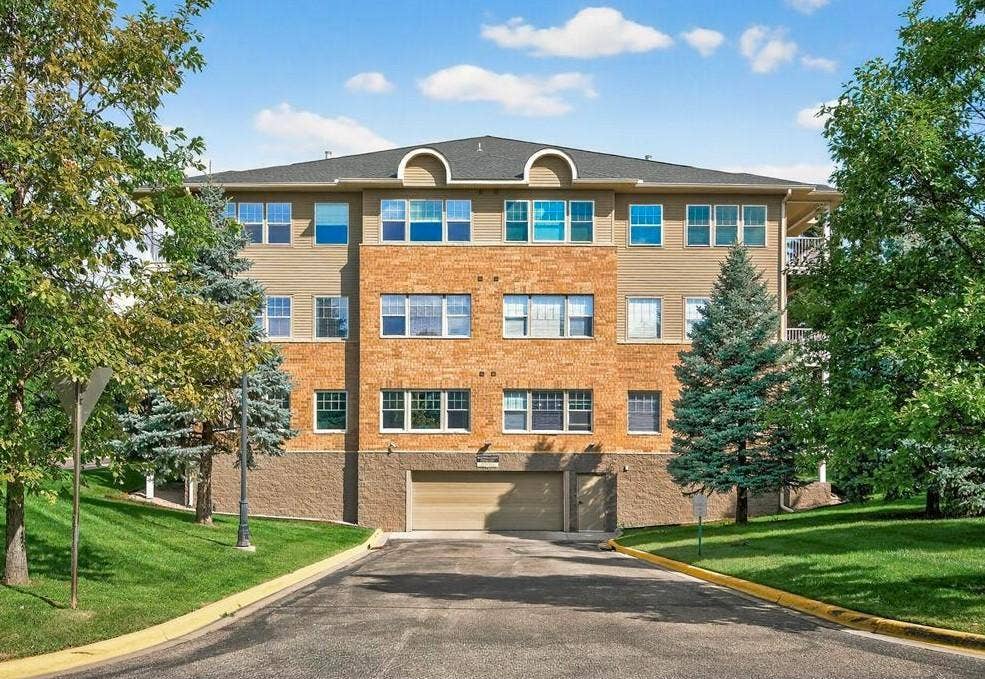 3800 85th Avenue N, #117, Brooklyn Park, MN 55443 Underground parking comes with this home. The underground space also offers a car wash and a wood working shop area.