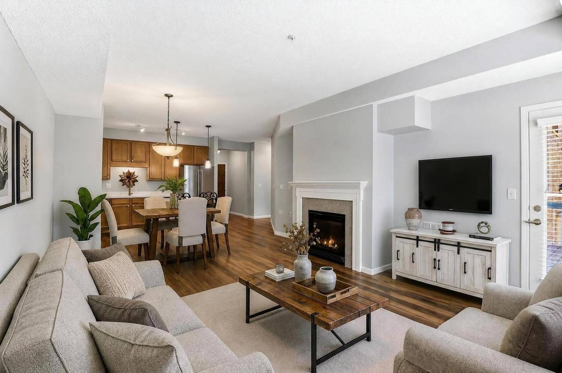 3800 85th Avenue N, #117, Brooklyn Park, MN 55443 Pride of ownership is evident throughout. Recently added, $25,000 in upgrades and high-end finishes. (Furniture in Image virtually staged)