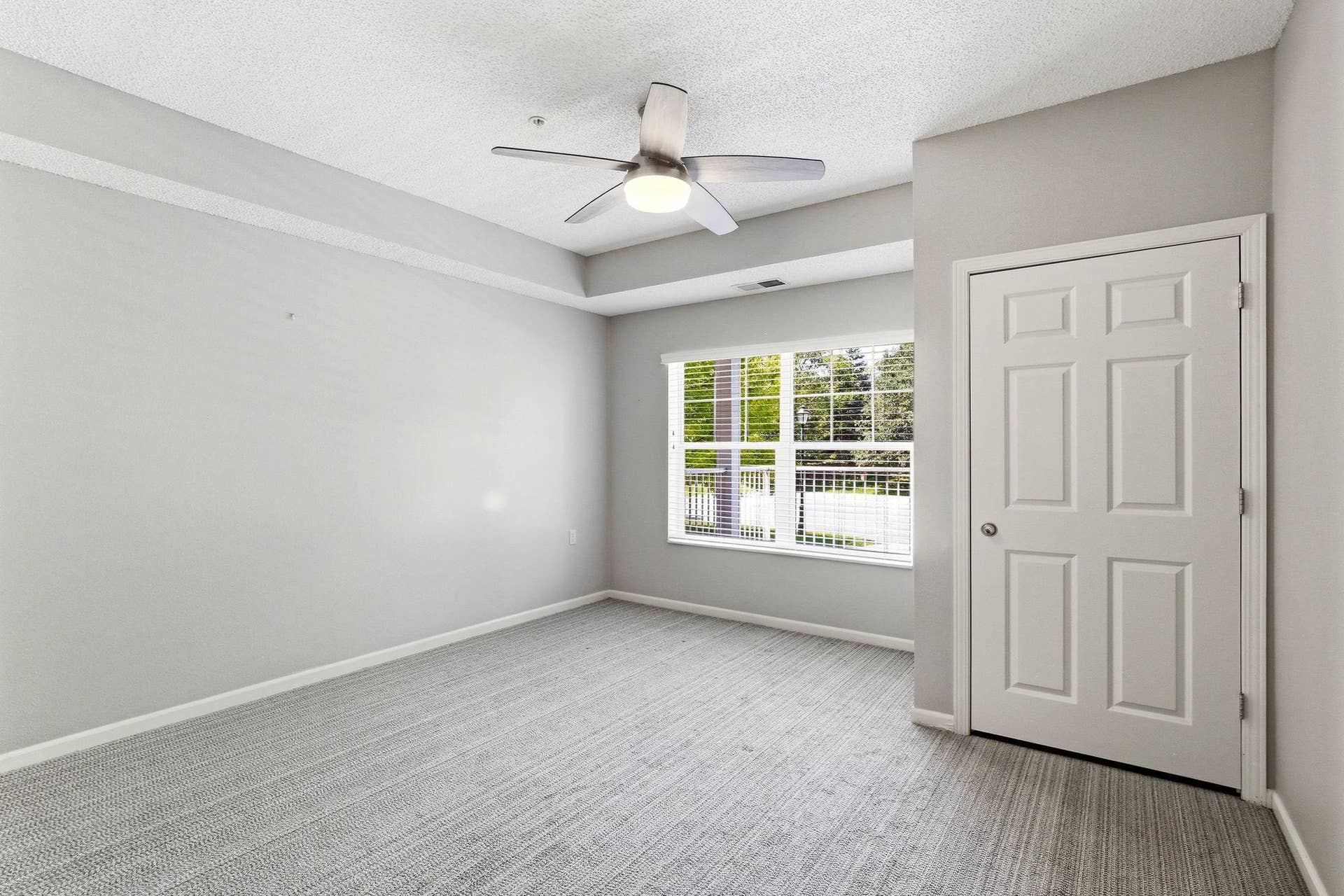3800 85th Avenue N, #117, Brooklyn Park, MN 55443 Featuring the bedroom upgraded Carpeting & custom wooden blinds