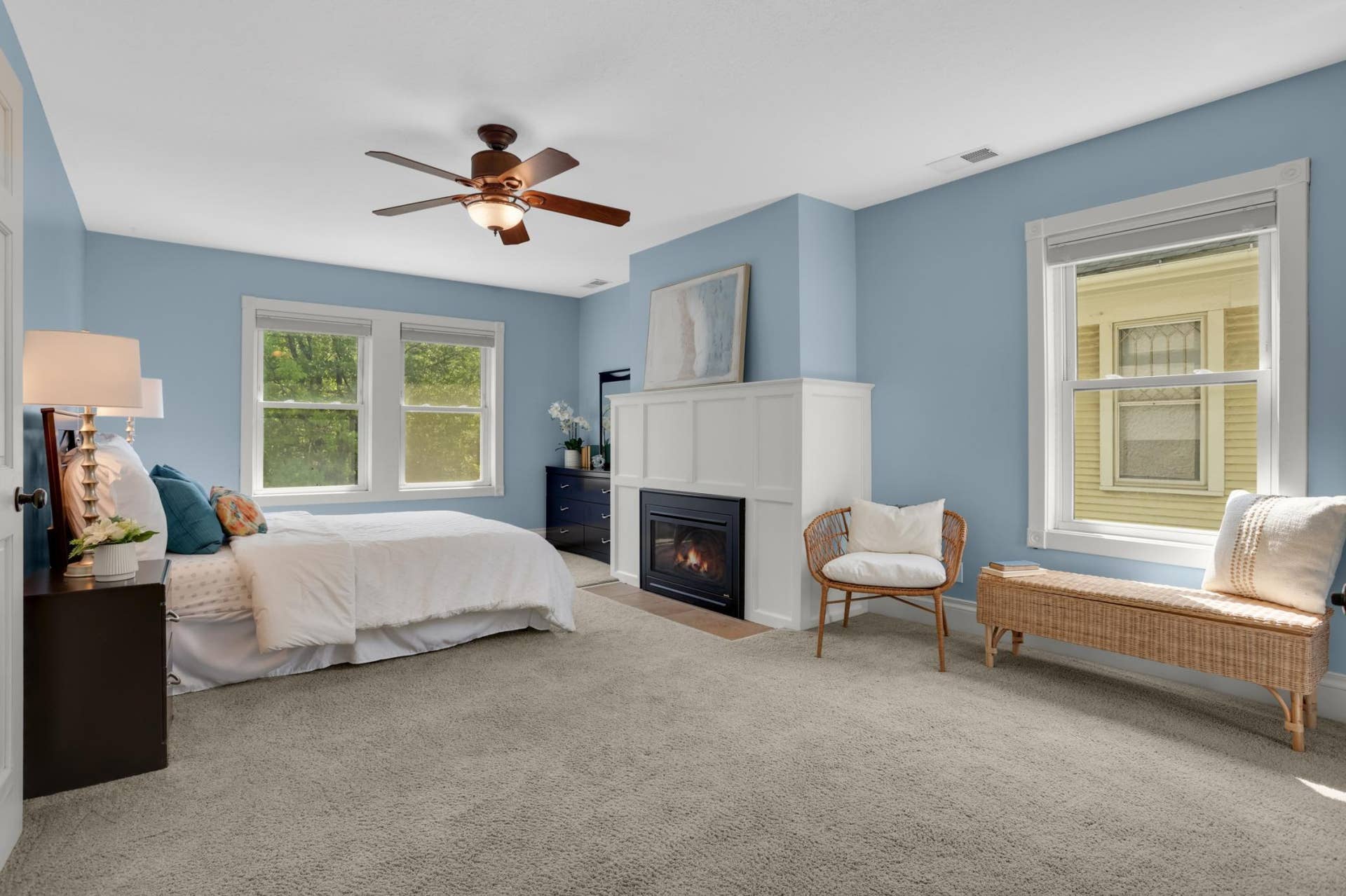 1117 Portland Avenue, 96, Saint Paul, MN 55104 Imagine ending your days in this peaceful primary bedroom, complete with cozy gas fireplace and walk-in closet. Light spills in from all sides.