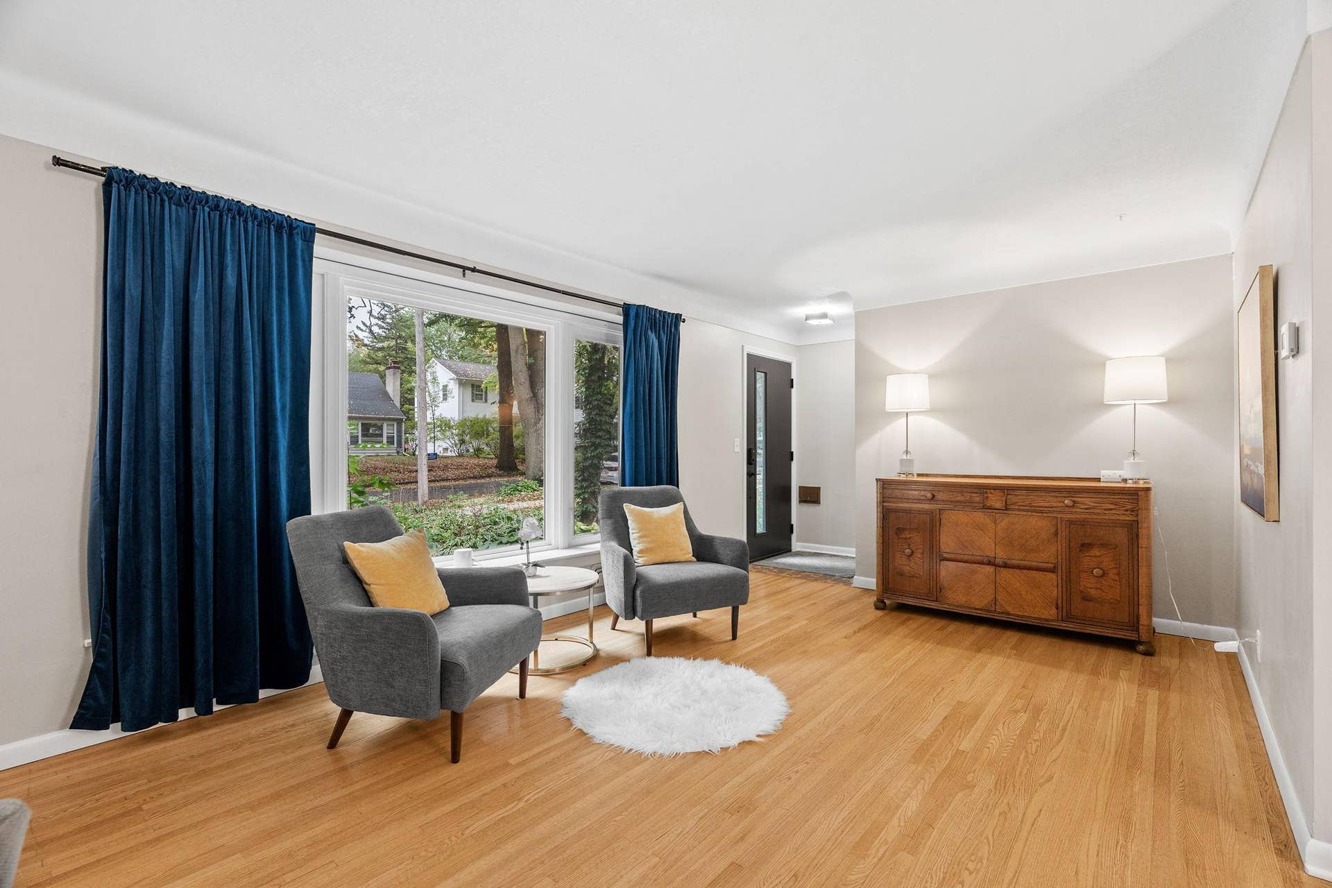 Bright and open main level with picture window and family room space. All new windows throughout the home in 2023.