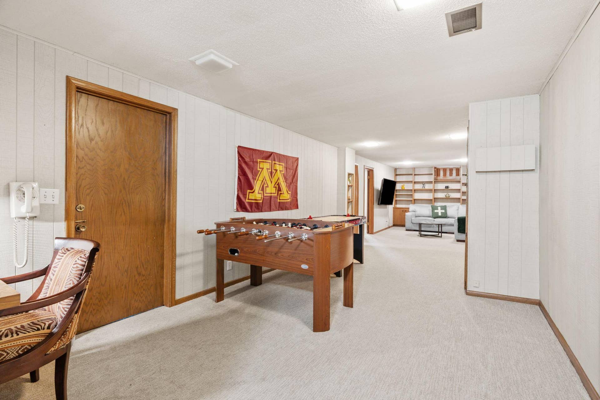Make your way down to the lower level! Great entertaining space with enough room for game tables.