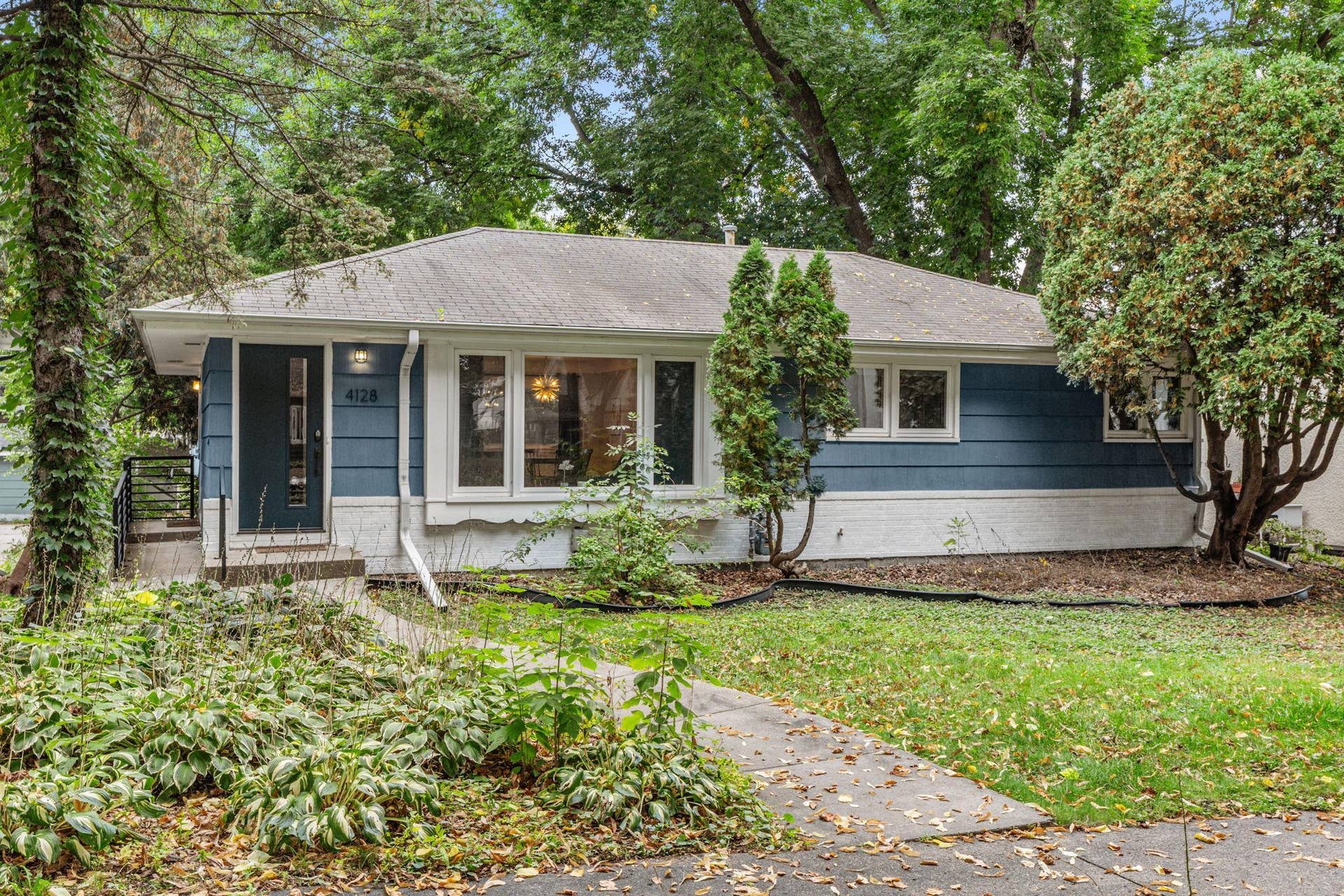 Welcome Home to 4128 Ewing Ave S, Minneapolis! This charming Linden Hills home has been thoughtfully updated throughout.
