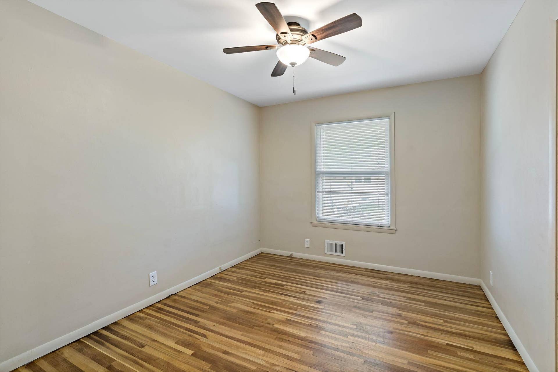 5749 Bloomington Avenue, 17, Minneapolis, MN 55417 First bedroom with hardwood flooring and ceiling fan.