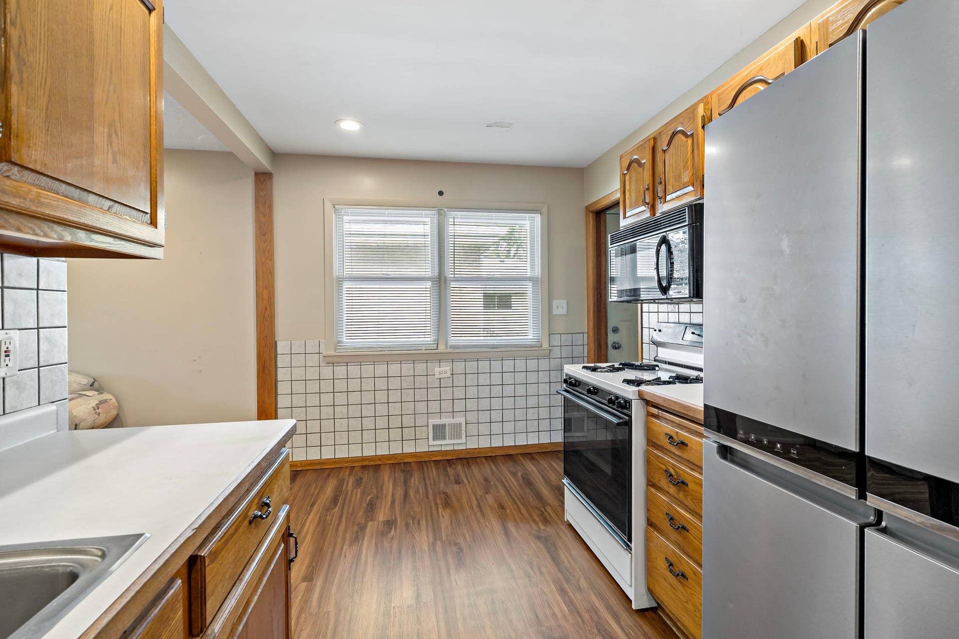 5749 Bloomington Avenue, 17, Minneapolis, MN 55417 Eat-in kitchen with large window providing natural light.