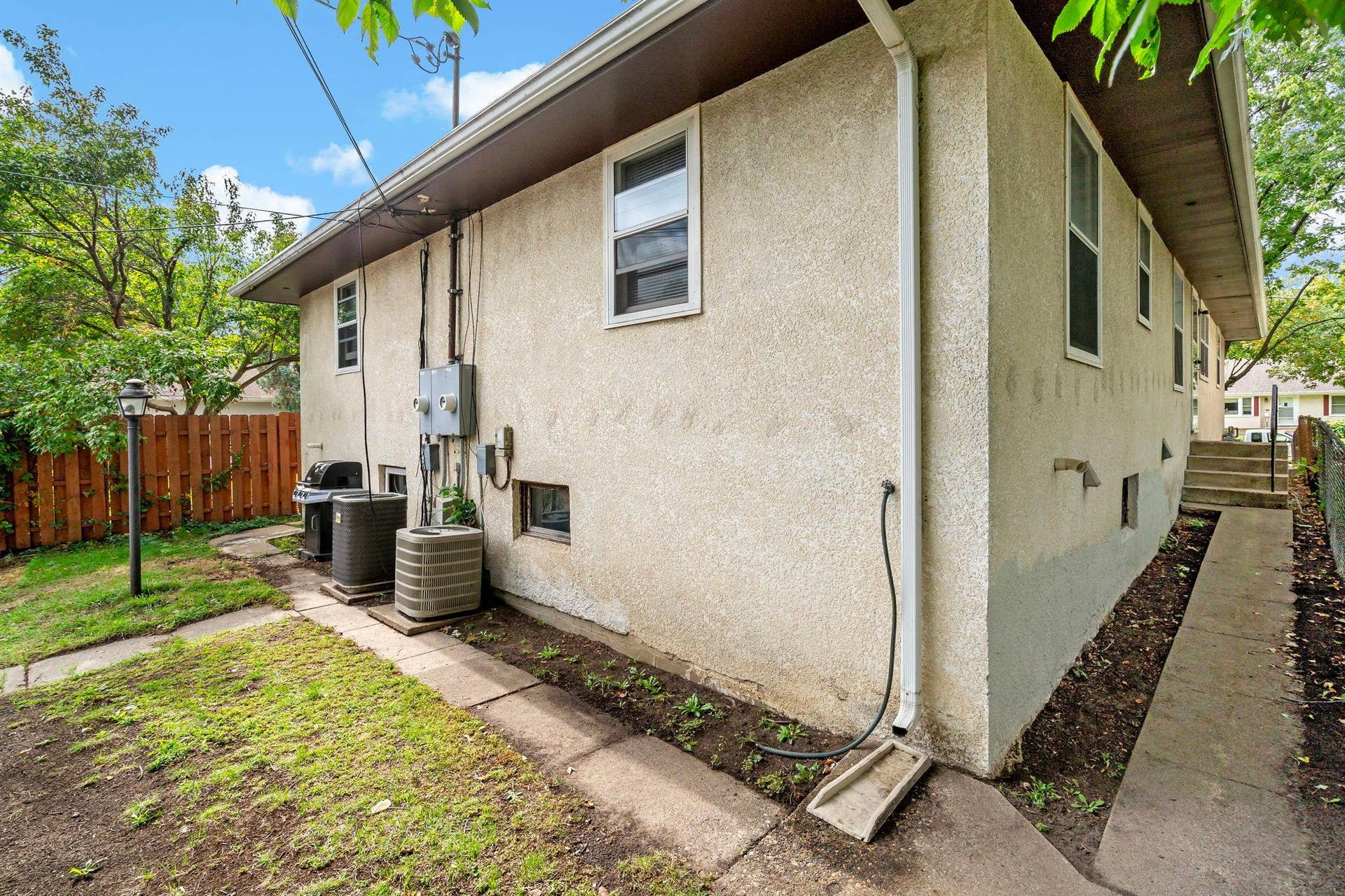 5749 Bloomington Avenue, 17, Minneapolis, MN 55417 Each unit has its own walkway from the alley. Walkway to Unit 5749 side entrance.