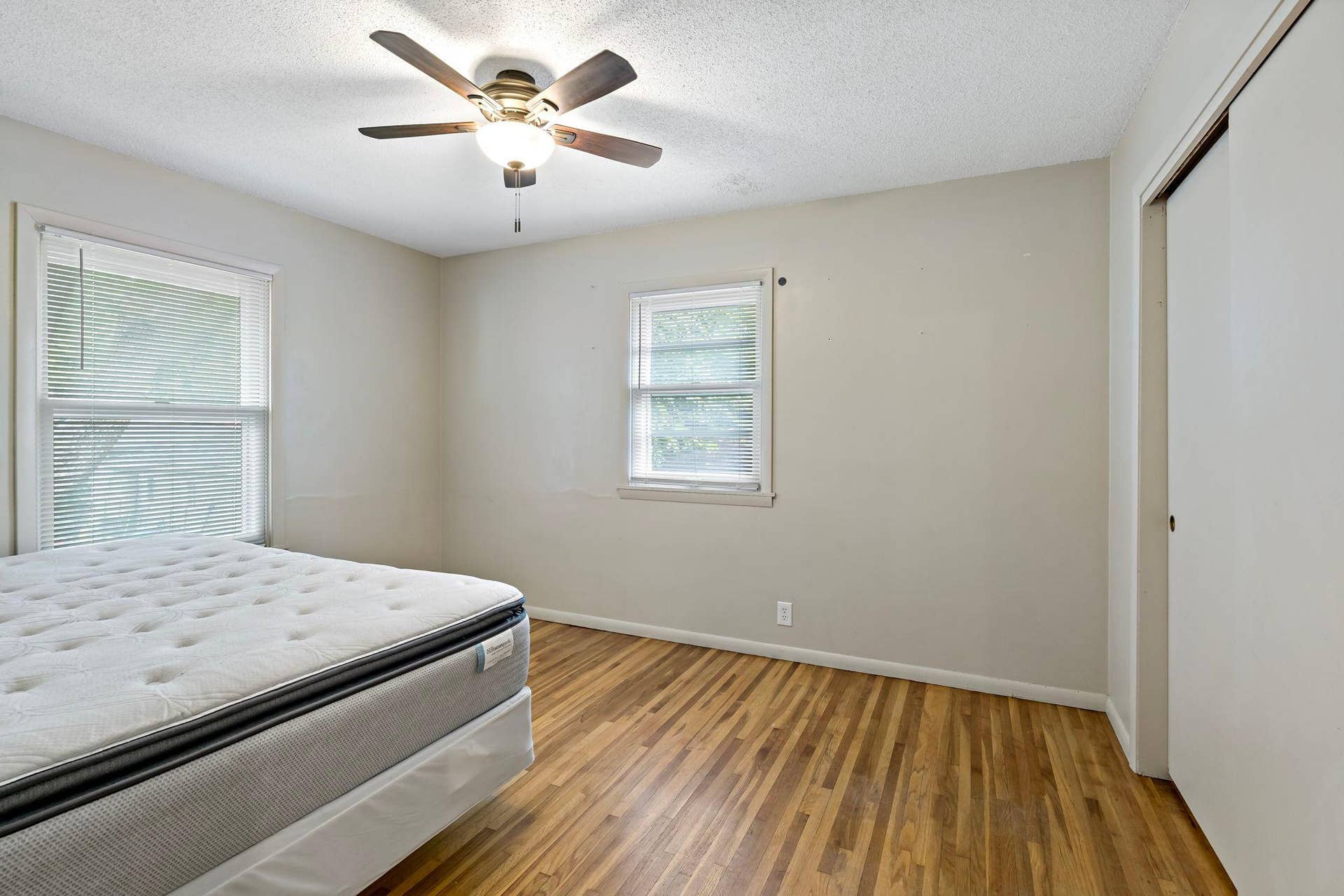 5749 Bloomington Avenue, 17, Minneapolis, MN 55417 Second bedroom with hardwood flooring and ceiling fan.