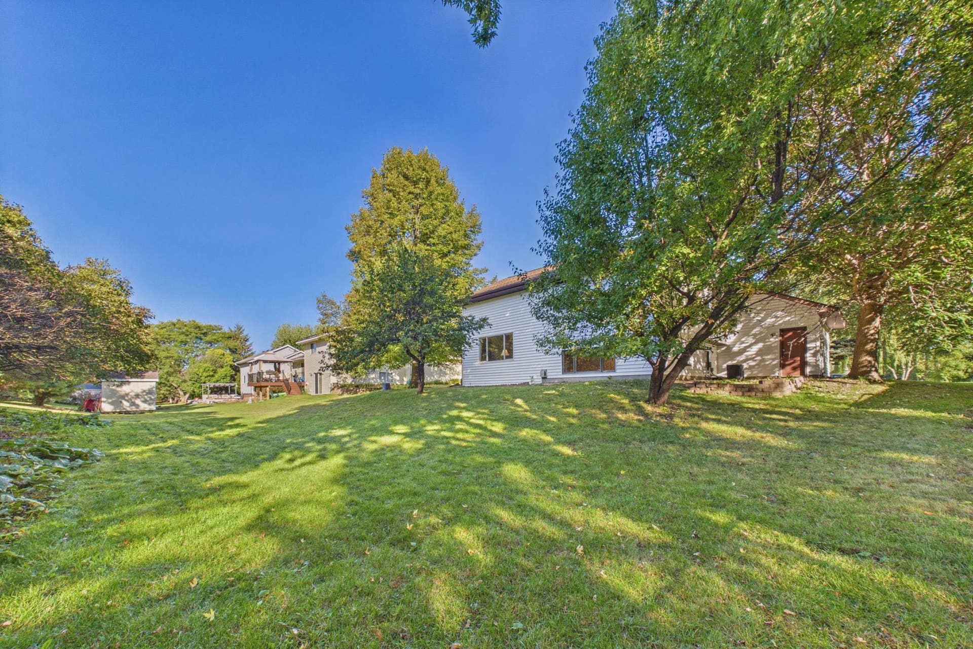 7081 Upper 36th Street N, Oakdale, MN 55128 Back of Home.jpg