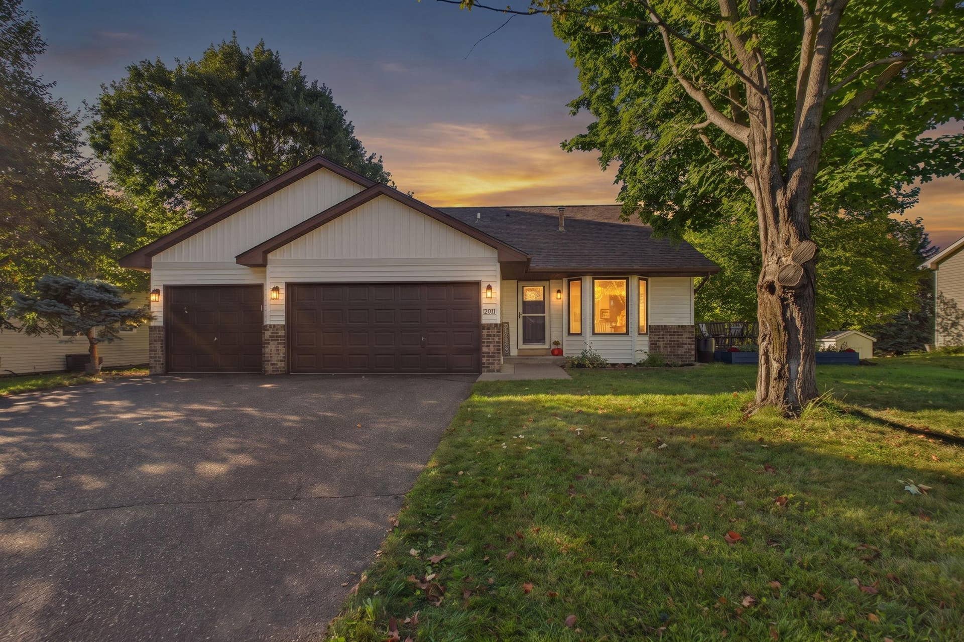 7081 Upper 36th Street N, Oakdale, MN 55128 Front of Home - Twilight.jpeg