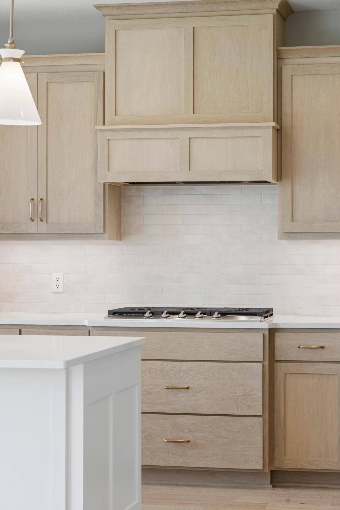 10409 Blackmoor Road, Woodbury, MN 55129 On-trend custom oak cabinets (photo of actual listing).