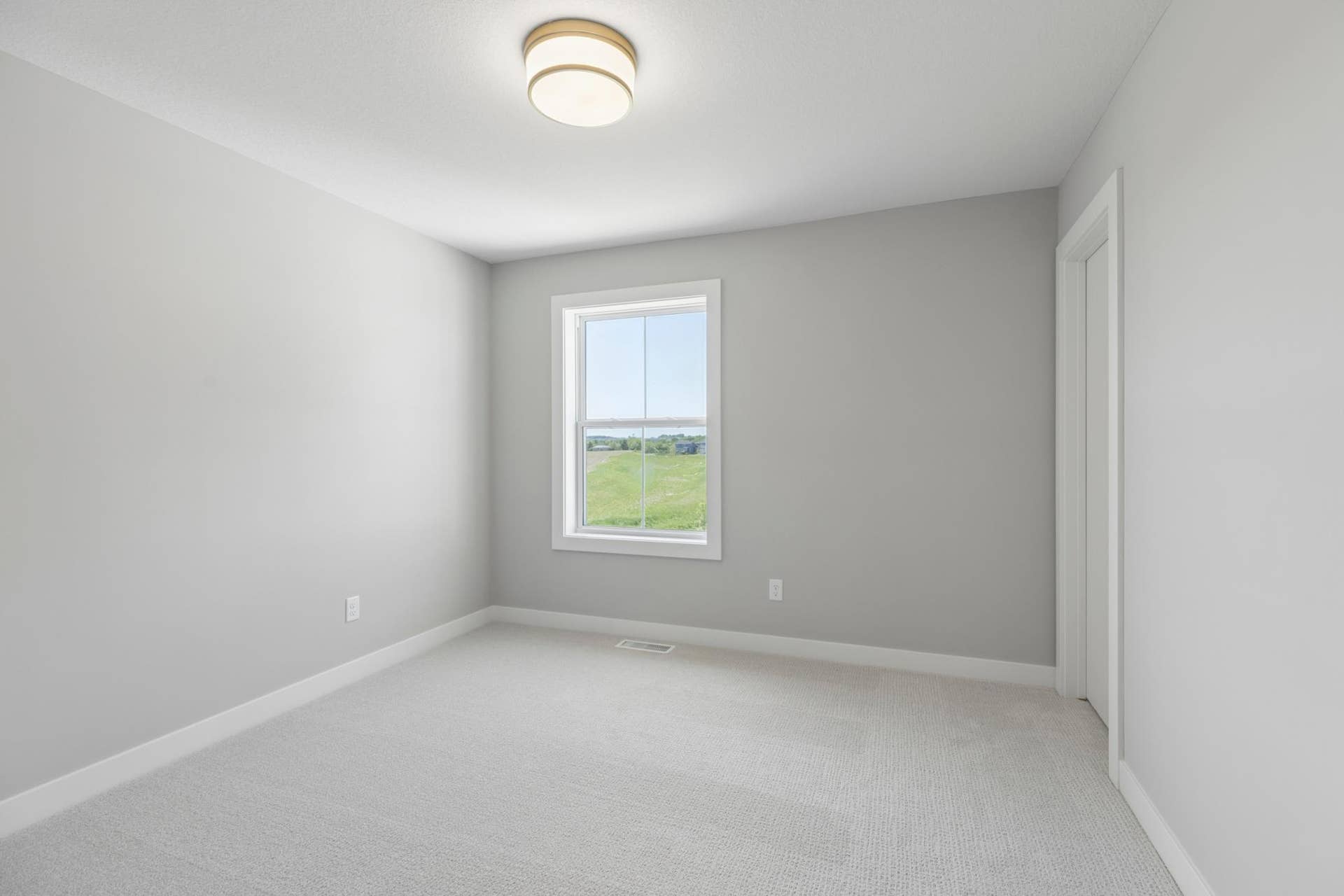 10409 Blackmoor Road, Woodbury, MN 55129 One of four bedrooms (photo of actual listing).