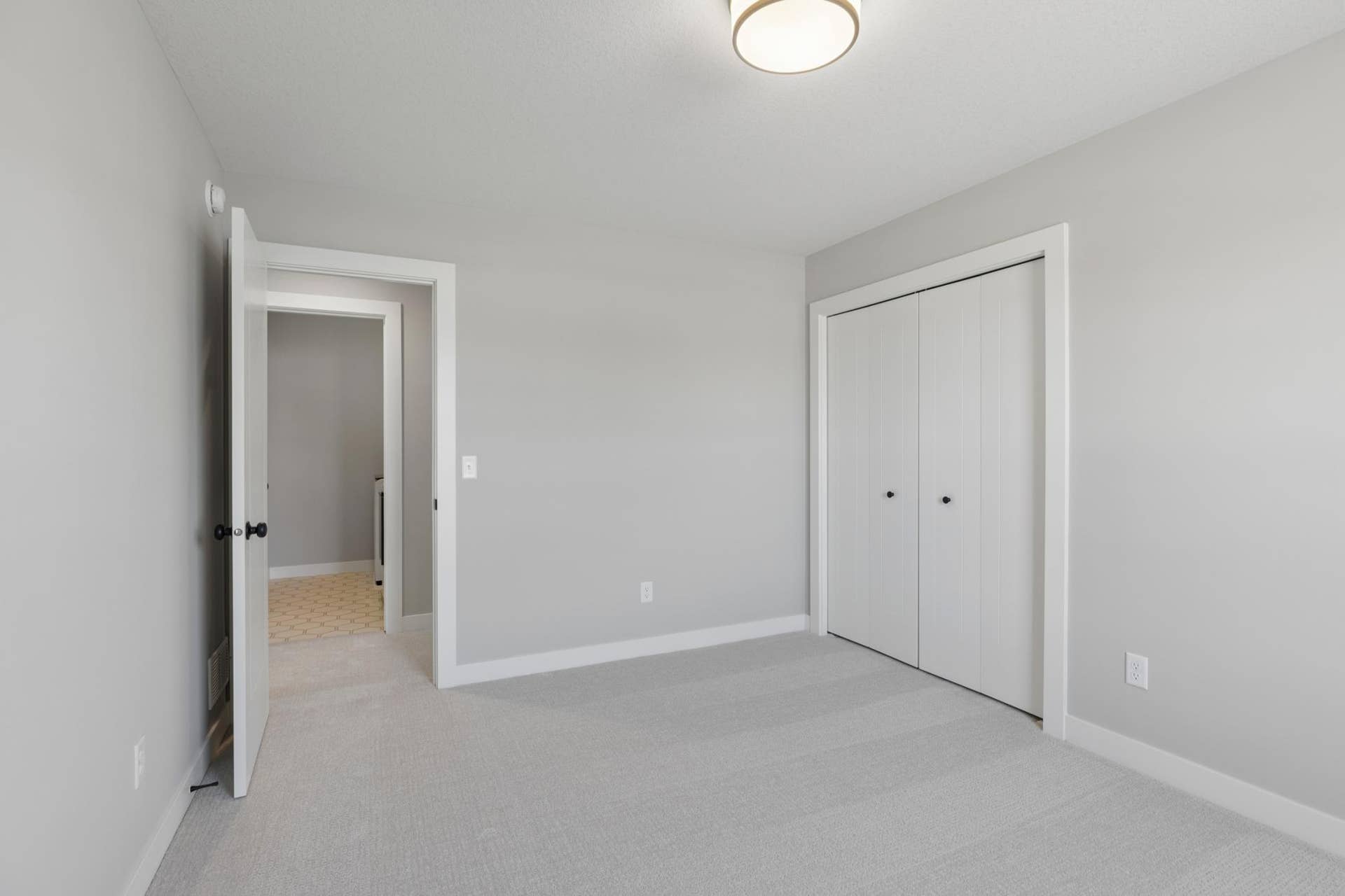 10409 Blackmoor Road, Woodbury, MN 55129 One of four bedrooms (photo of actual listing).