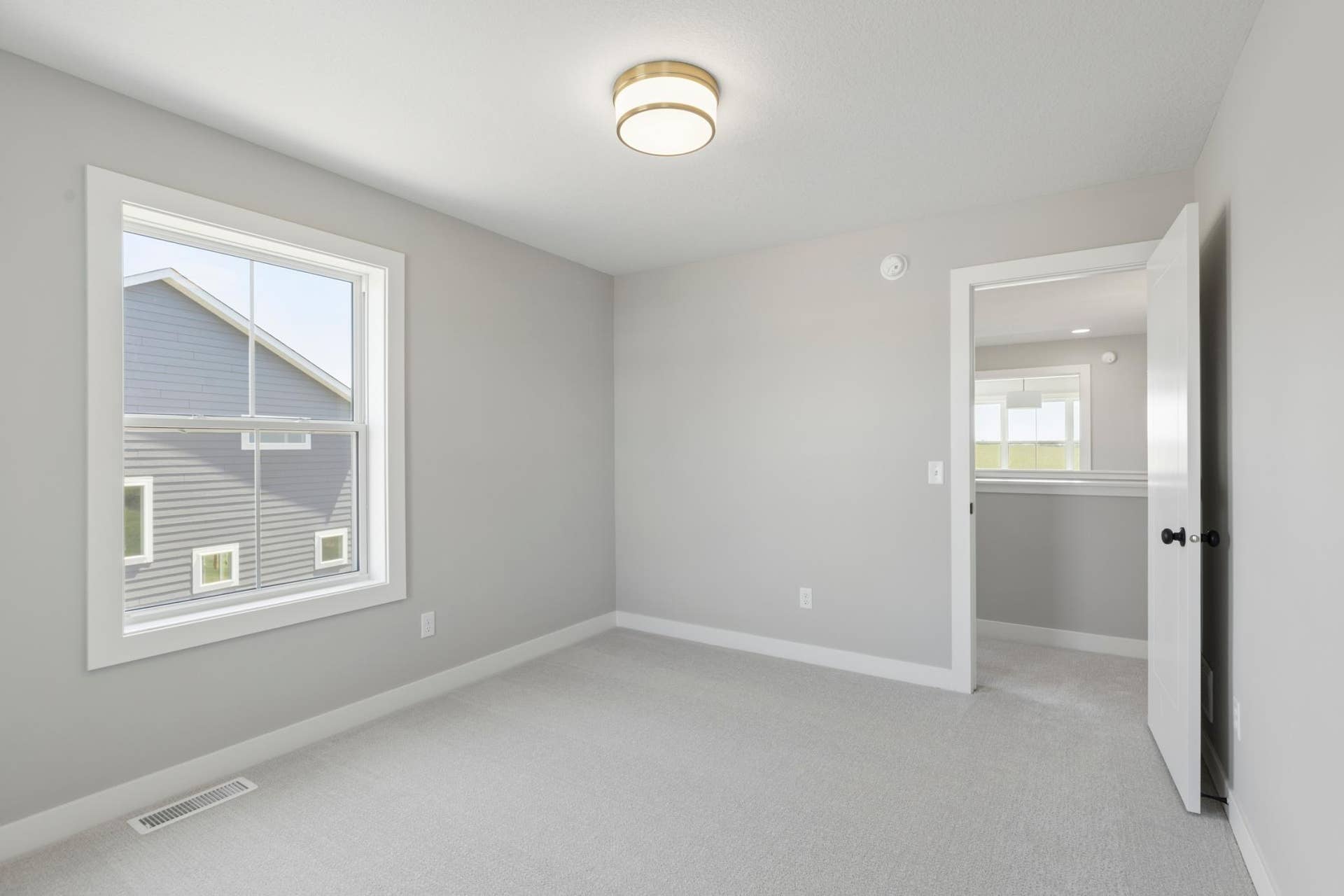 10409 Blackmoor Road, Woodbury, MN 55129 One of four bedrooms (photo of actual listing).