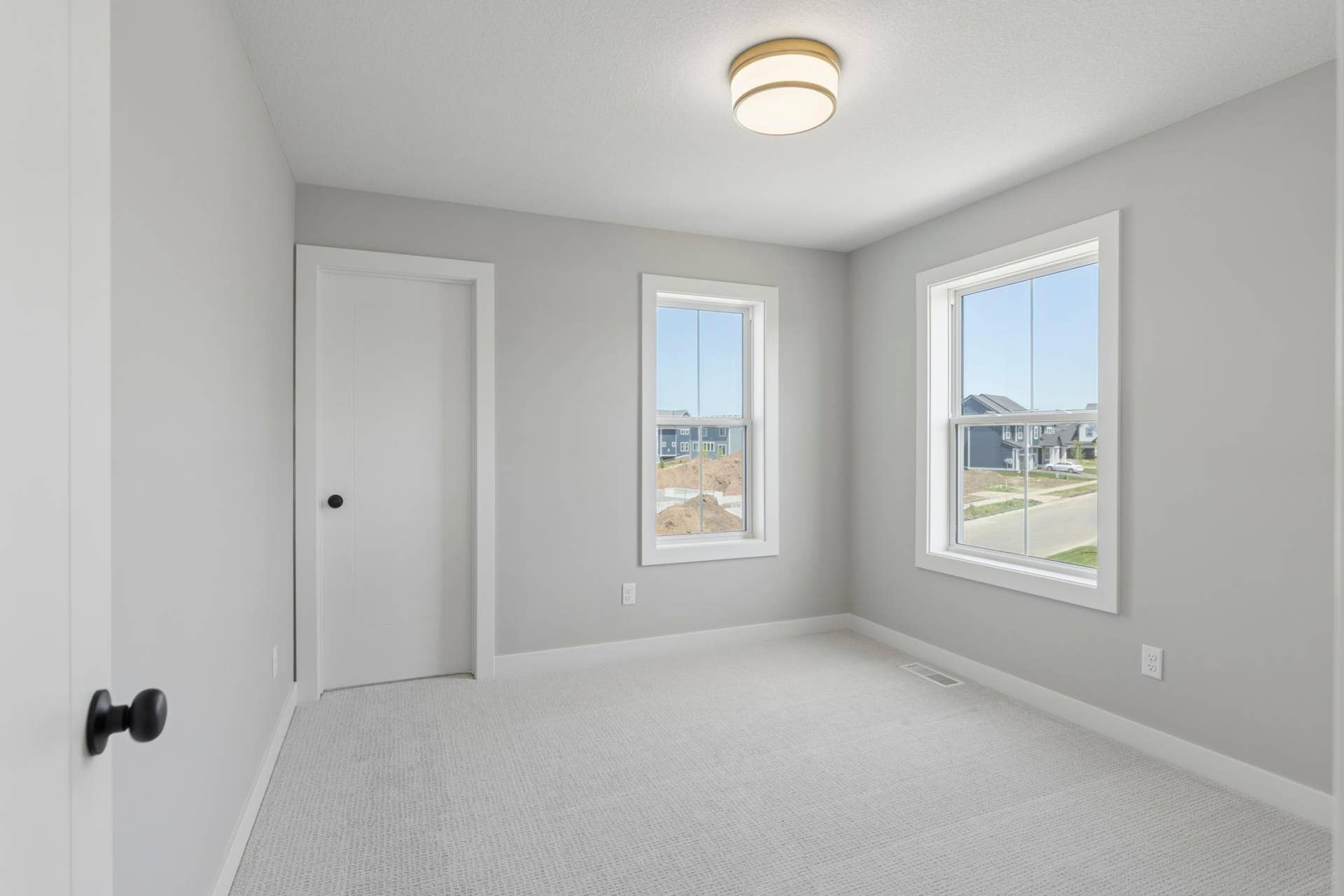 10409 Blackmoor Road, Woodbury, MN 55129 One of four bedrooms includes windows on two different walls (photo of actual listing).