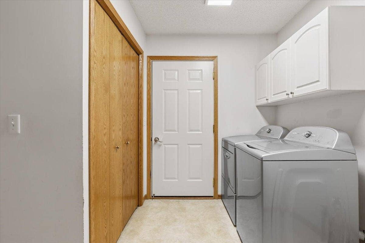 7987 Forest Boulevard, #Unit F, Woodbury, MN 55125 Laundry Room leading to the Garage