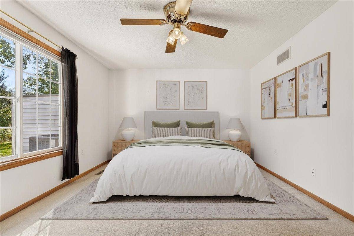 7987 Forest Boulevard, #Unit F, Woodbury, MN 55125 Primary Bedroom Virtually Staged