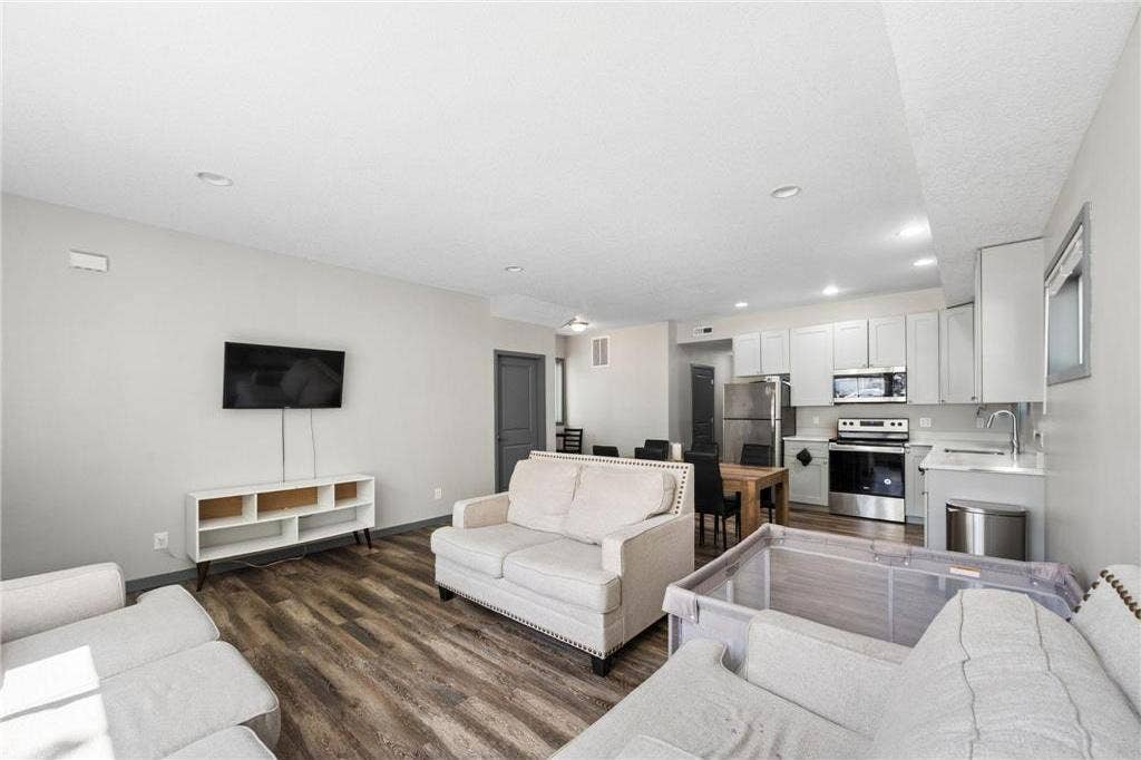 211 Belvidere Street E, 104, Saint Paul, MN 55107 211-Belvidere-Street-E-Saint-Paul-MN-55107-07-Living-Dining-and-Kitchen-AI-Edited.jpg