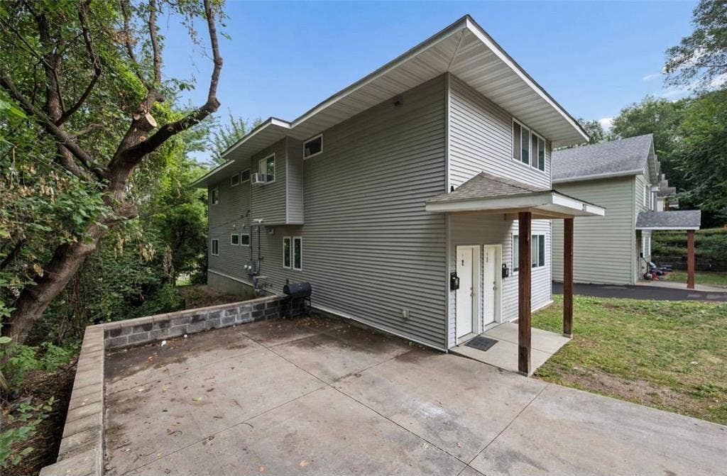 211 Belvidere Street E, 104, Saint Paul, MN 55107 211-Belvidere-Street-E-Saint-Paul-MN-55107-04-Side-Exterior-and-Driveway.jpg