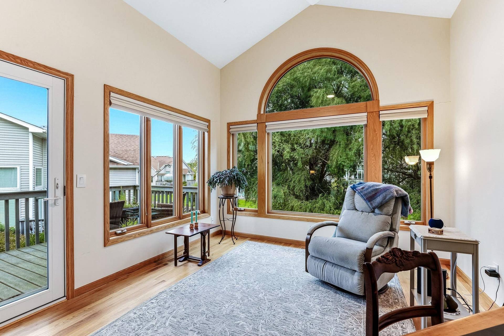 Sunroom off the living room offers deck access