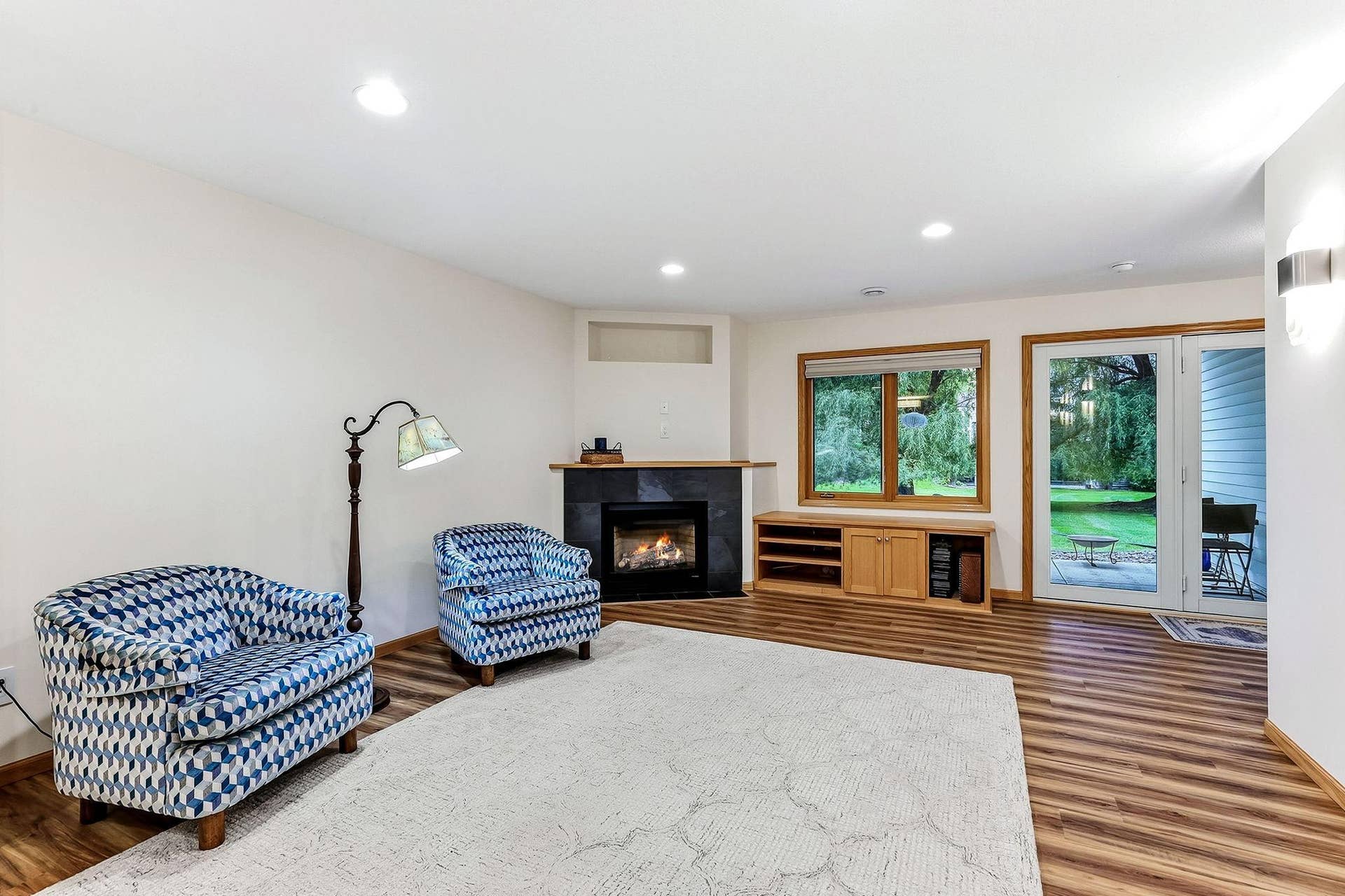 Lower level family room also has a fireplace