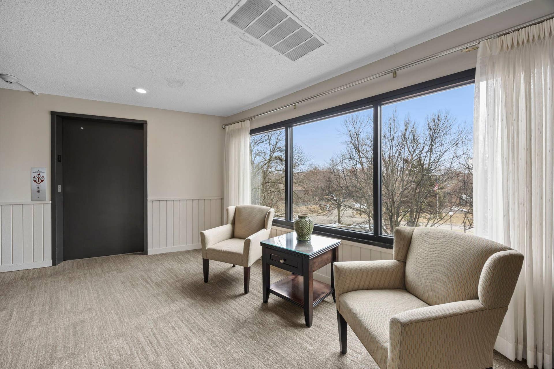 3150 Glen Oaks Avenue, #311A, White Bear Lake, MN 55110 Sitting area outside the elevators on the 3rd floor.