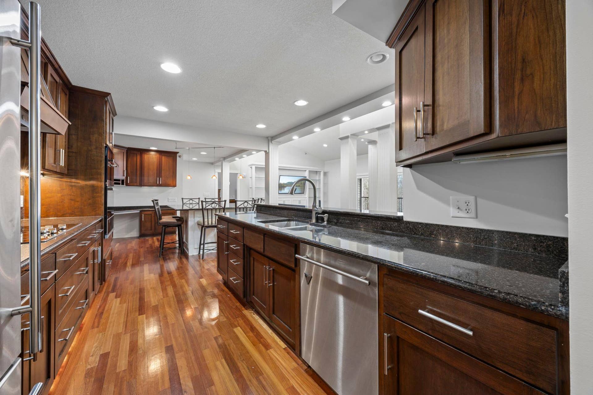 3150 Glen Oaks Avenue, #311A, White Bear Lake, MN 55110 The kitchen is open to the entire living space of the condo, enjoy cherry cabinets, Stainless steel appliances including a new double oven/microwave!