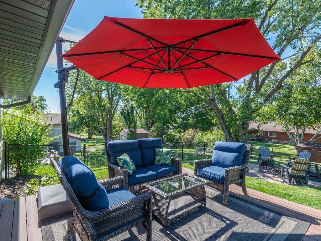 13008 Lakeview Drive Drive, Burnsville, MN 55337 The backyard deck provides a comfortable spot to relax outdoors.