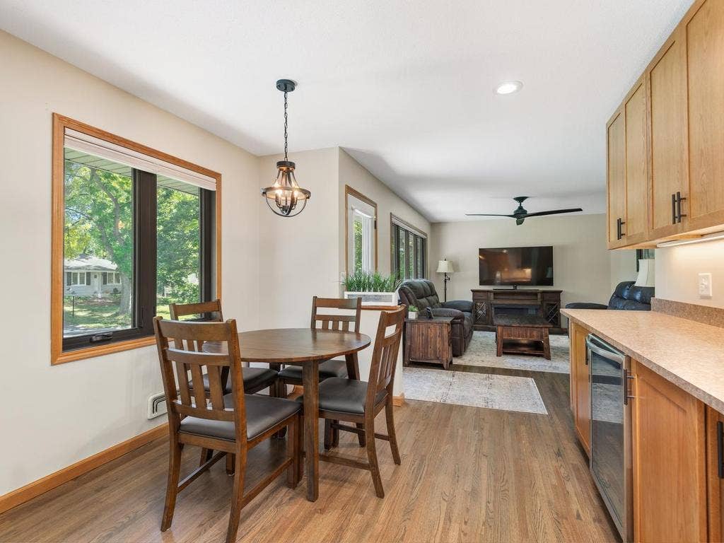 13008 Lakeview Drive Drive, Burnsville, MN 55337 An open view from the kitchen through the dining area to the living room.