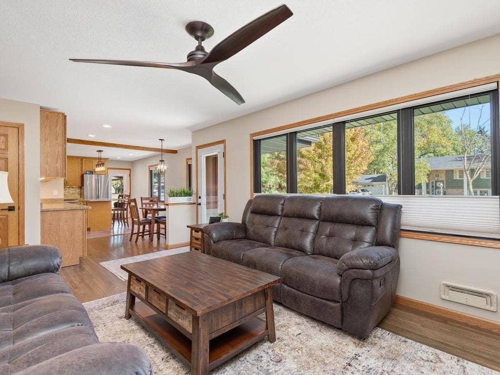 13008 Lakeview Drive Drive, Burnsville, MN 55337 The living room opens to the dining area and kitchen, making it easy to gather and entertain.