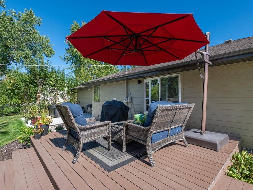 13008 Lakeview Drive Drive, Burnsville, MN 55337 Another view of the deck, with room for seating and easy access to the yard.