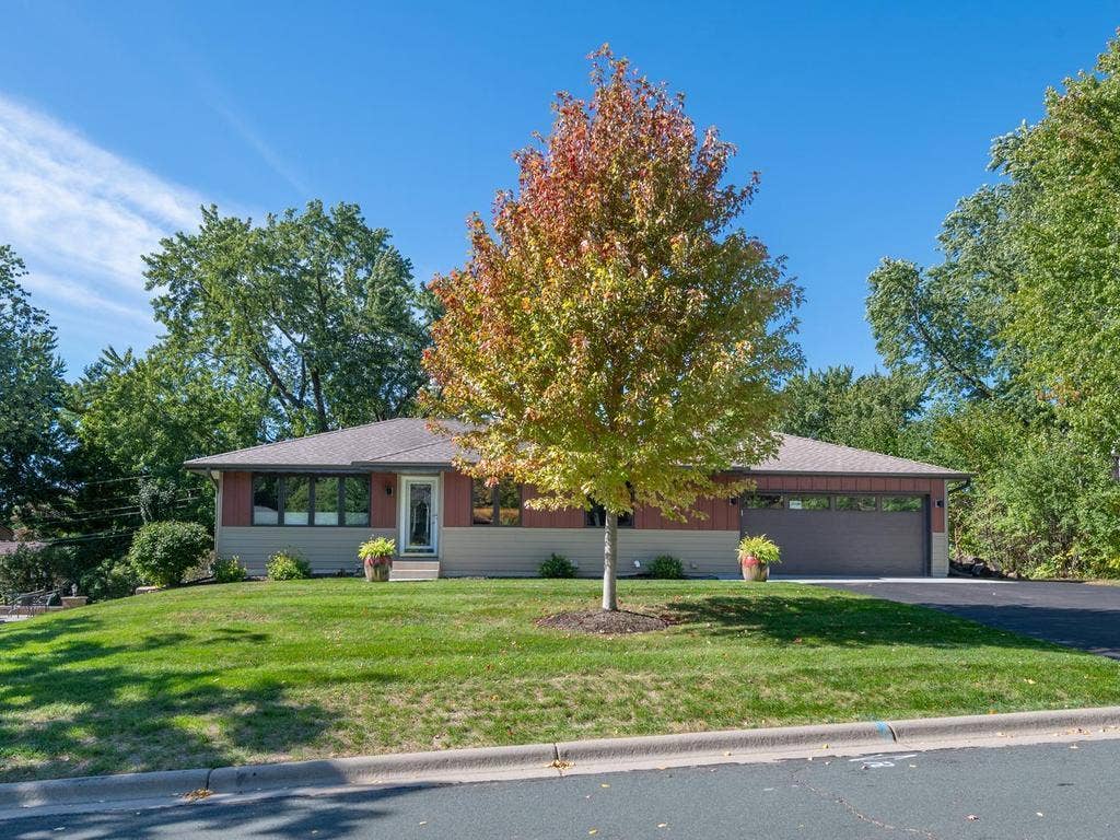 13008 Lakeview Drive Drive, Burnsville, MN 55337 Set back from the street on a generously sized lot in a Burnsville neighborhood.
